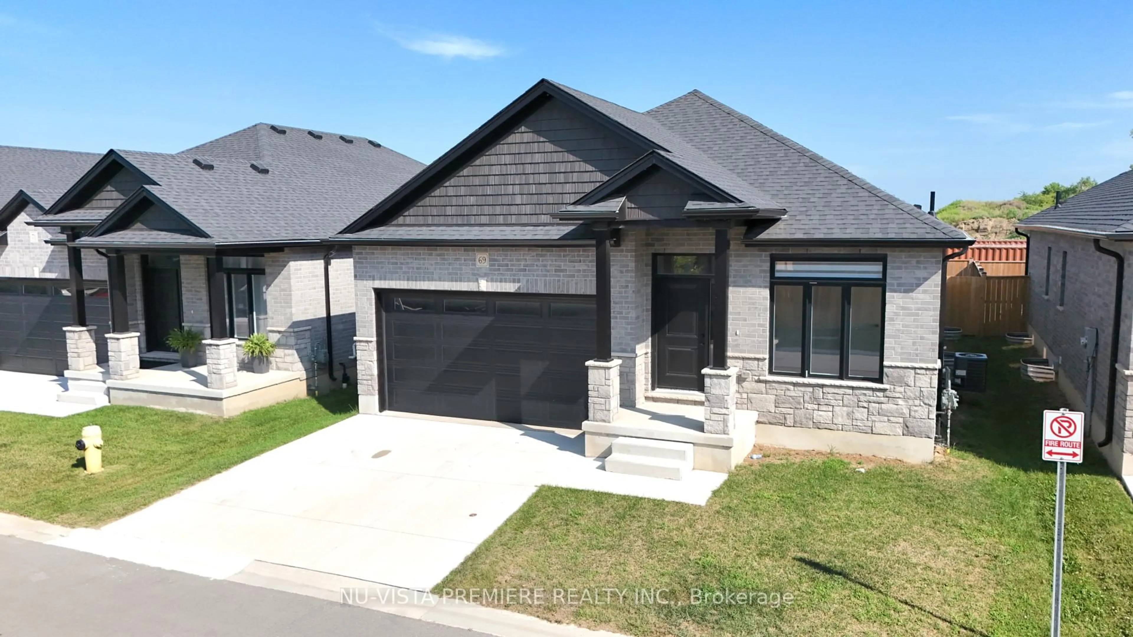 Home with brick exterior material, street for 383 Daventry Way #69, Middlesex Centre Ontario N0L 1R0
