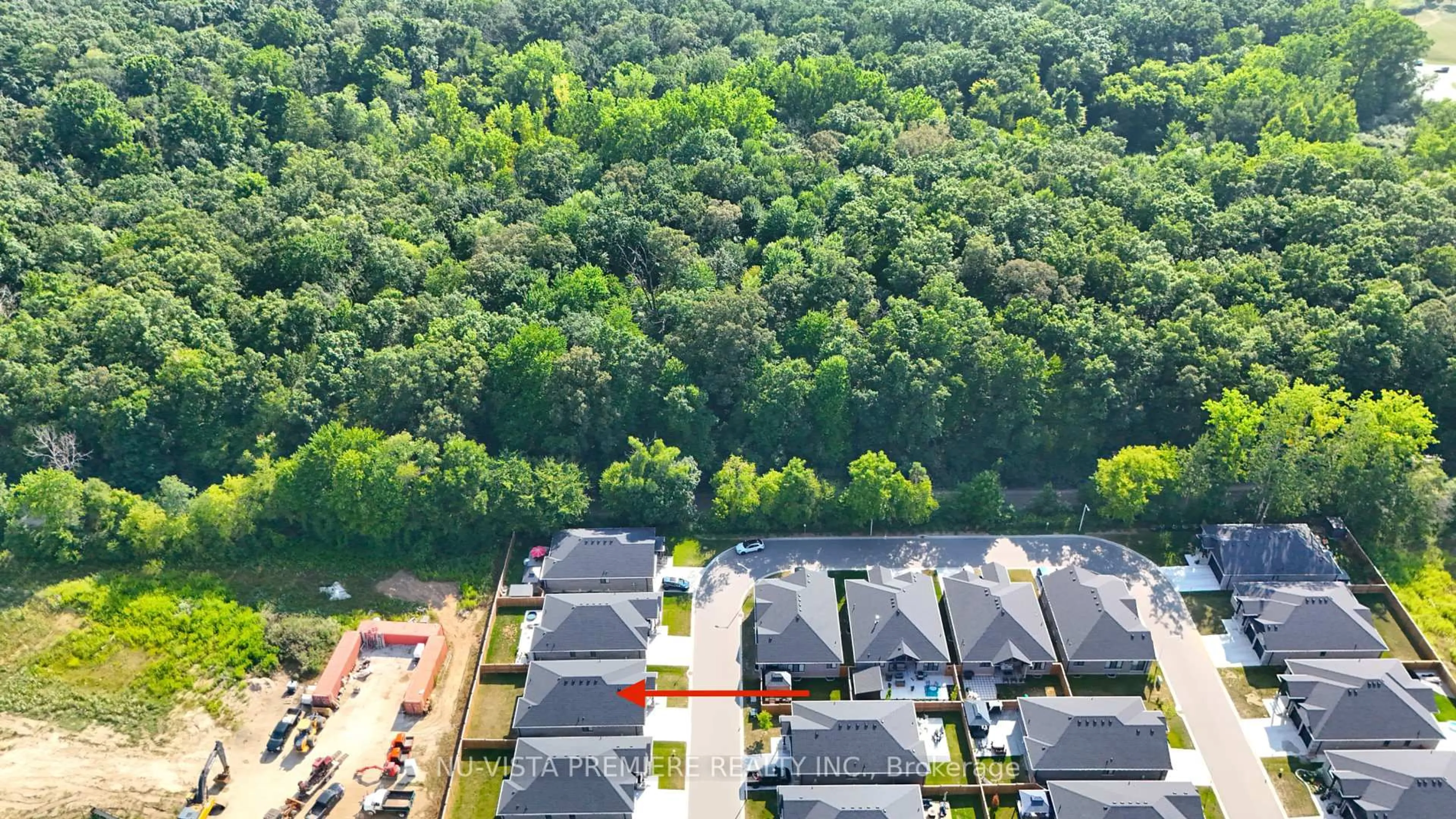 A pic from outside/outdoor area/front of a property/back of a property/a pic from drone, forest/trees view for 383 Daventry Way #69, Middlesex Centre Ontario N0L 1R0