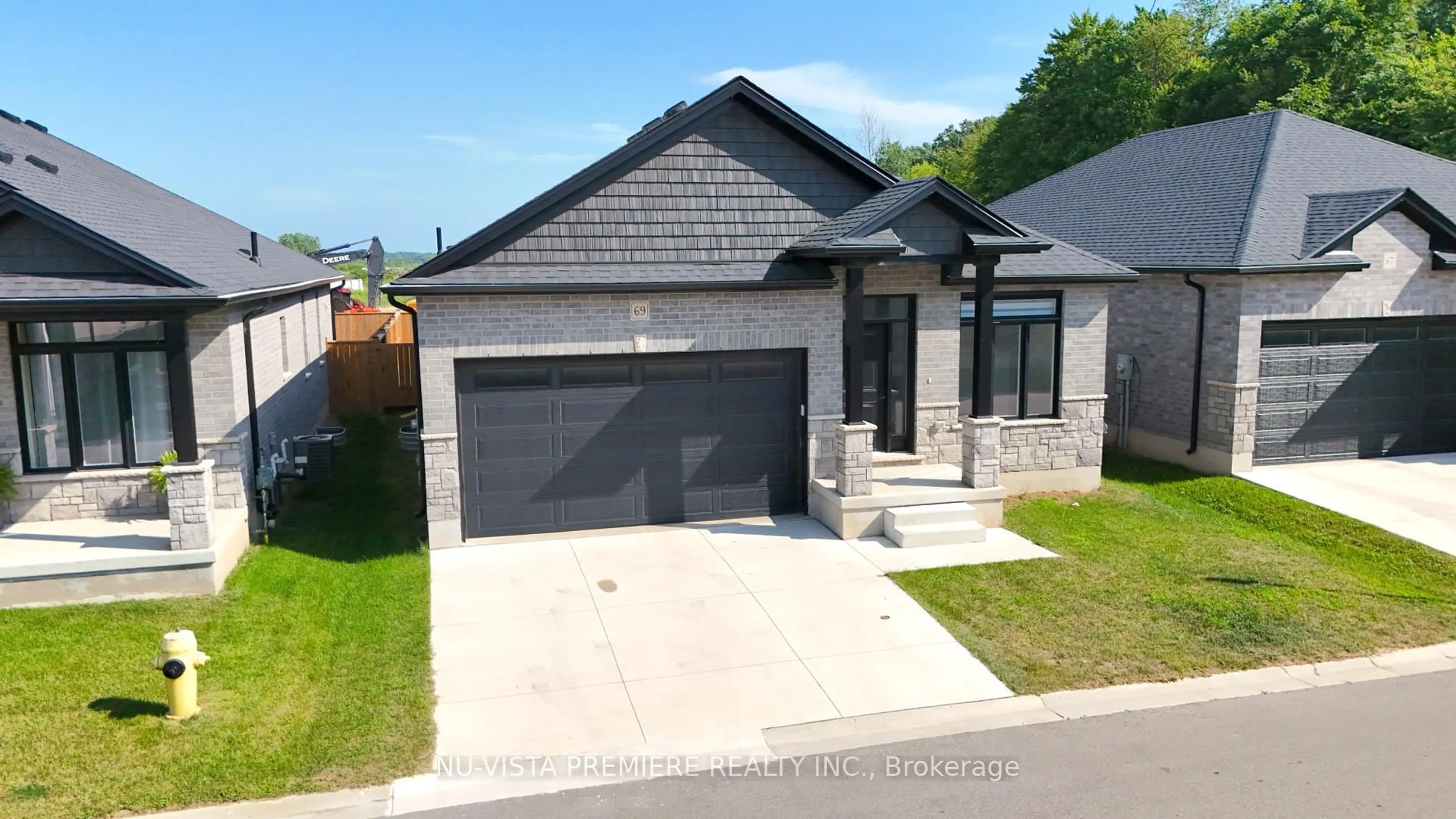 Home with brick exterior material, street for 383 Daventry Way #69, Middlesex Centre Ontario N0L 1R0