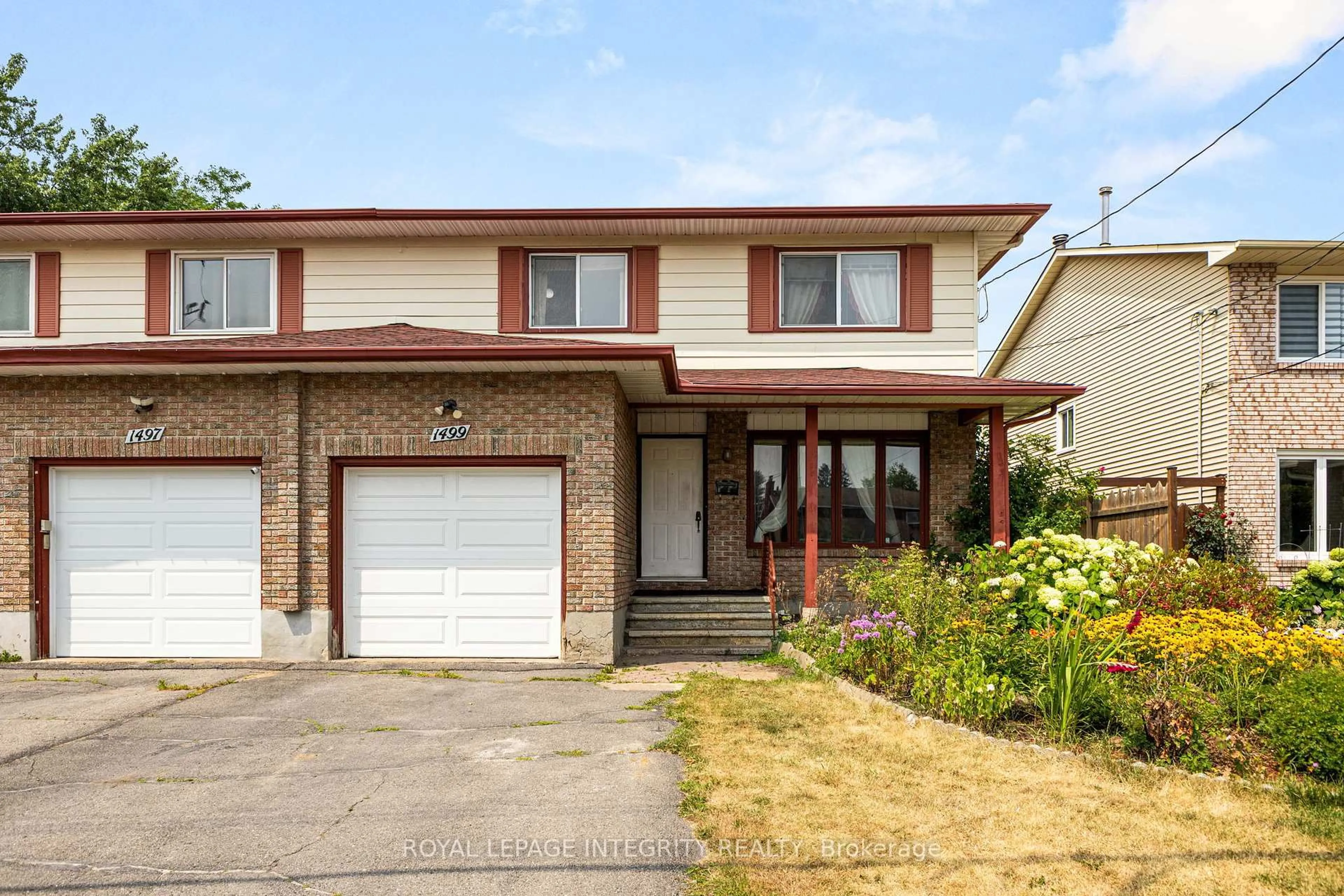 Home with vinyl exterior material, street for 1499 Goth Ave, Ottawa Ontario K1T 1E3