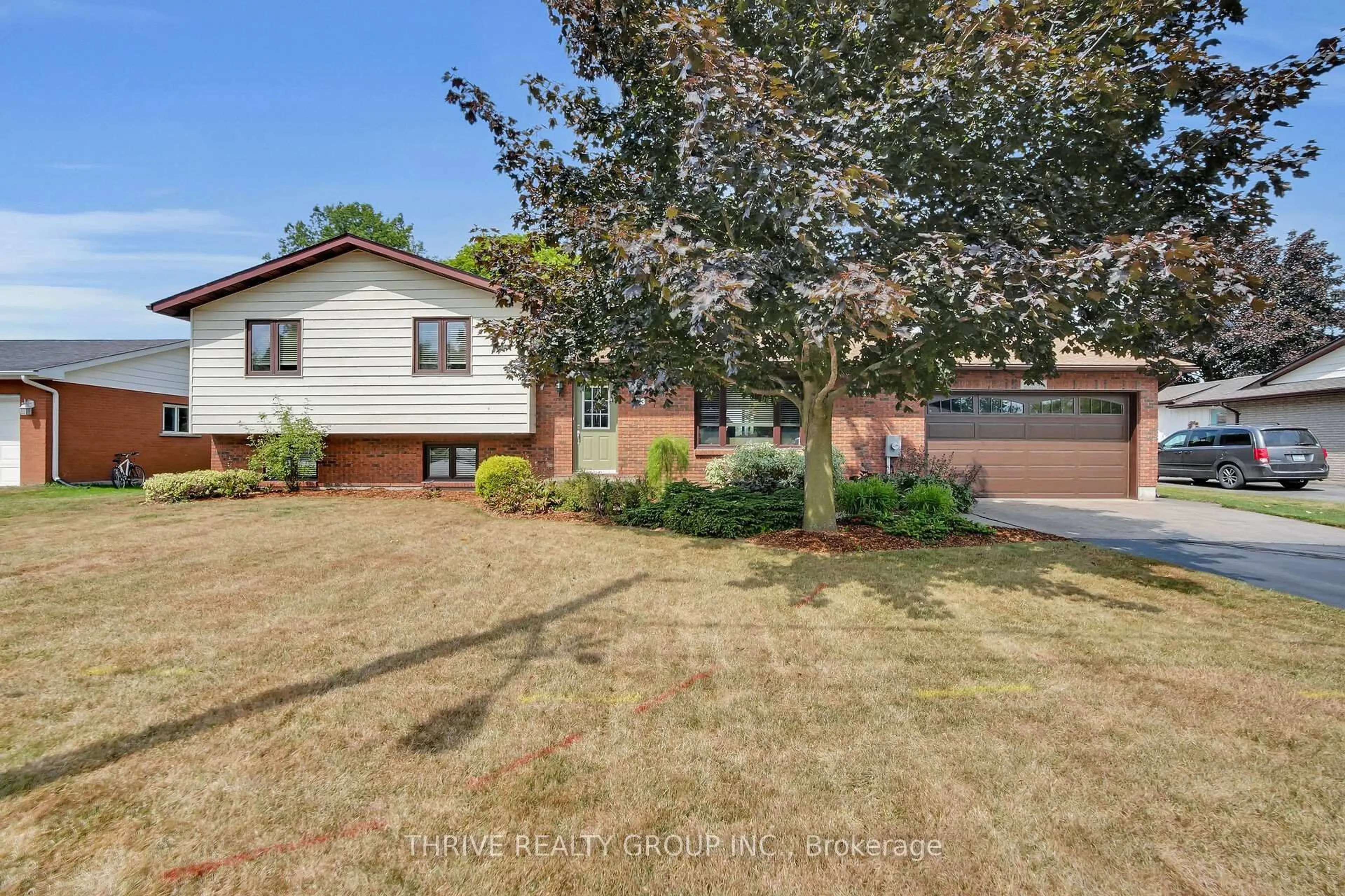A pic from outside/outdoor area/front of a property/back of a property/a pic from drone, street for 123 Michelle Ave, North Middlesex Ontario N0M 2K0