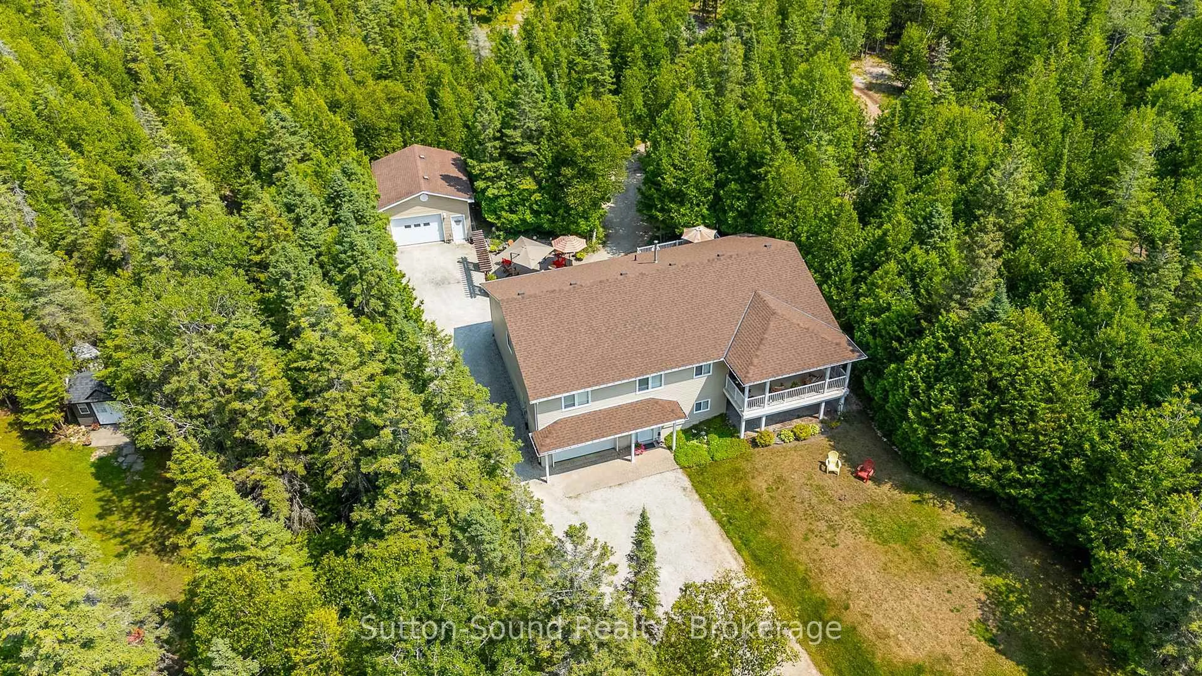 A pic from outside/outdoor area/front of a property/back of a property/a pic from drone, unknown for 1215 Sunset Dr, South Bruce Peninsula Ontario N0H 2T0