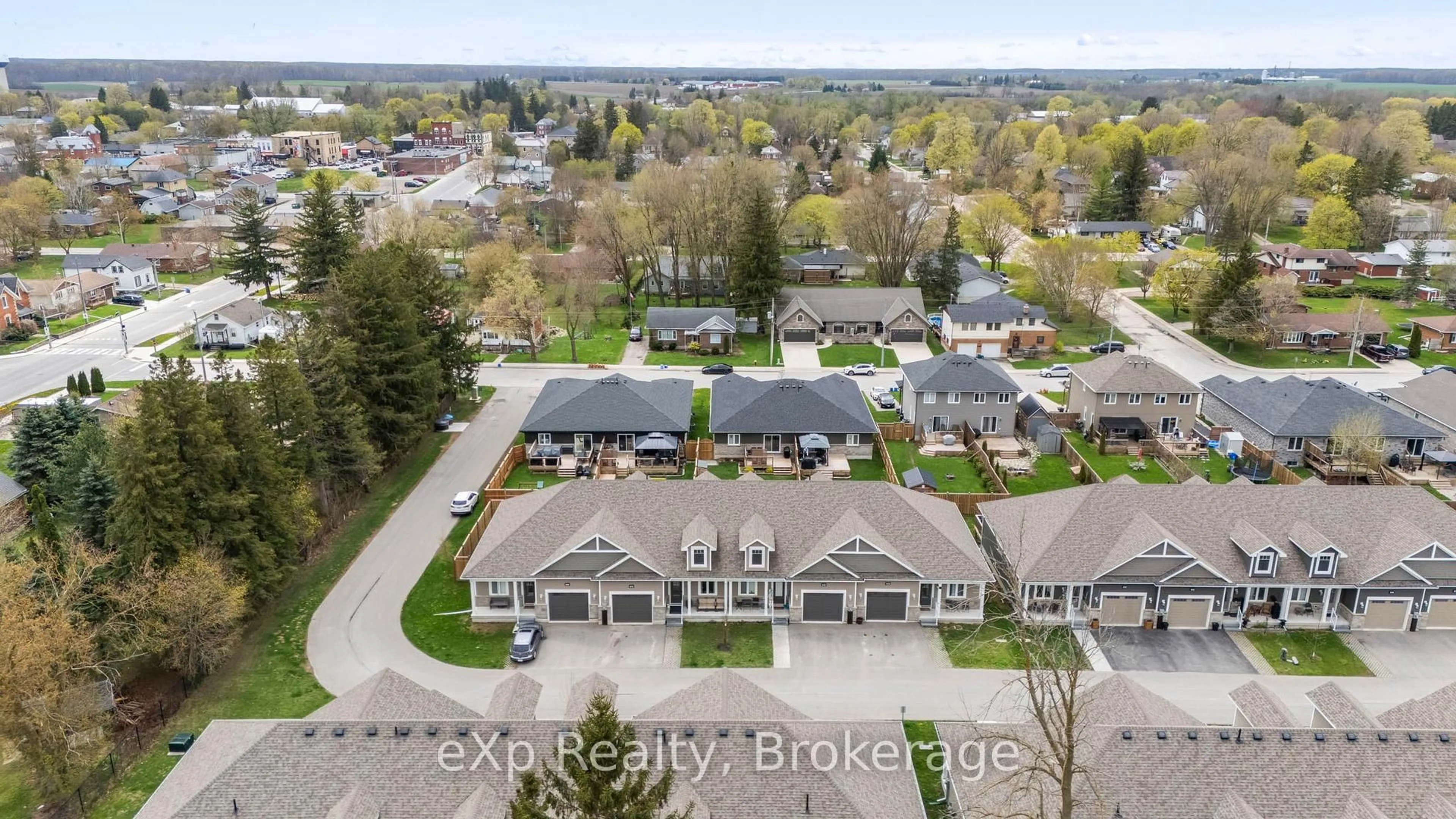 A pic from outside/outdoor area/front of a property/back of a property/a pic from drone, street for 24 George St #4, Minto Ontario N0G 1Z0