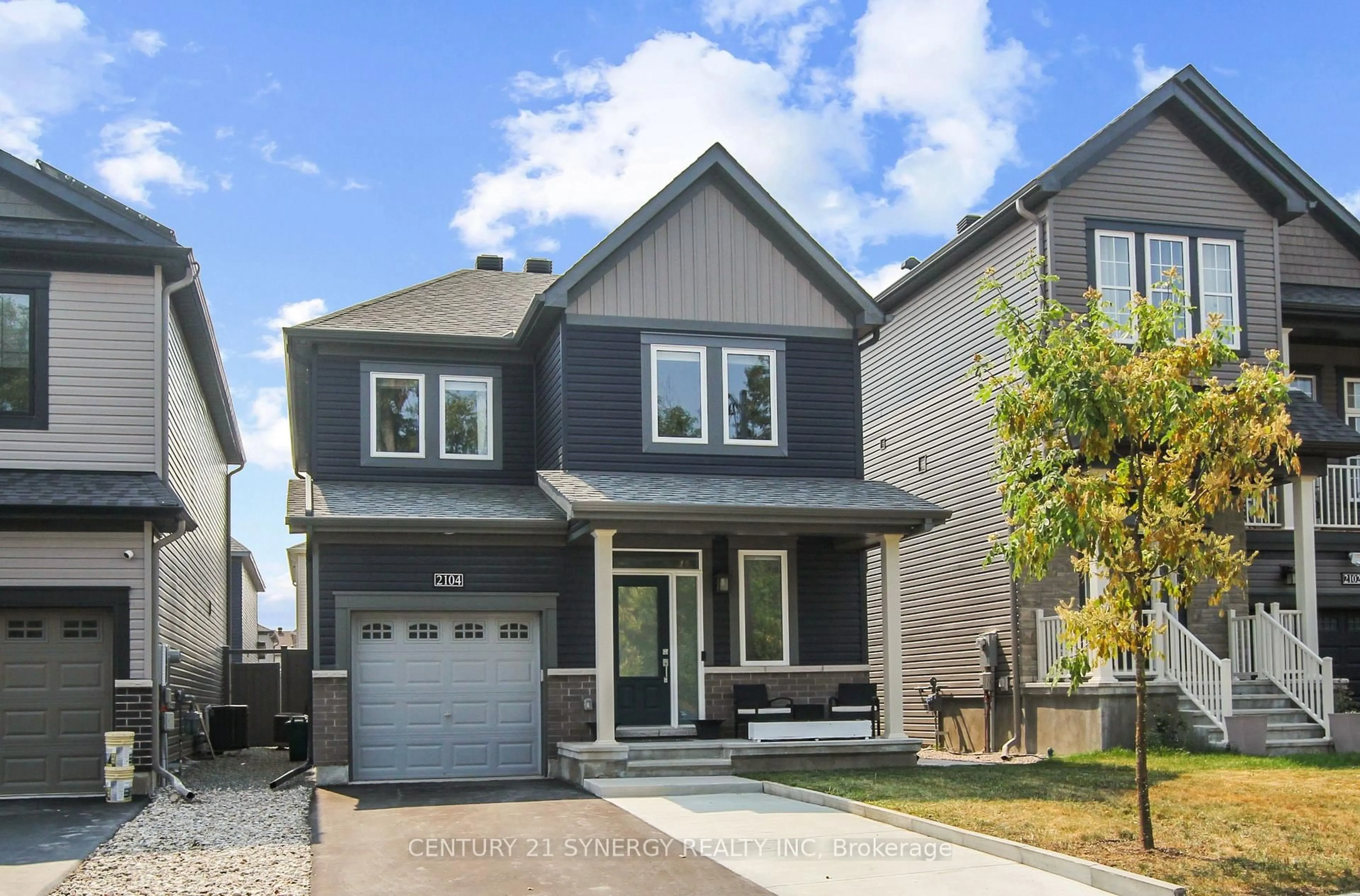 Home with vinyl exterior material, street for 2104 Caltra Cres, Ottawa Ontario K2J 6V4