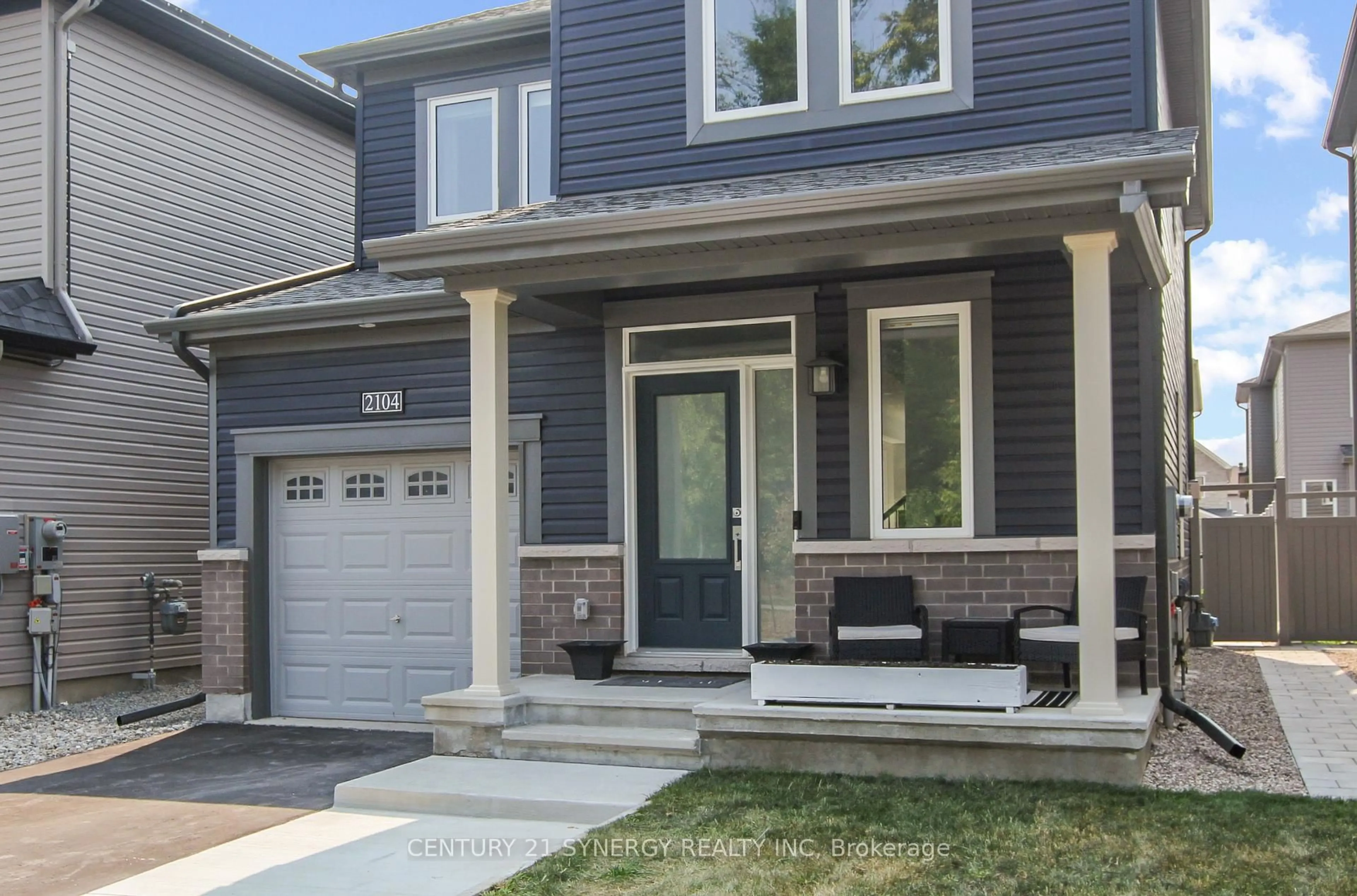 Home with vinyl exterior material, street for 2104 Caltra Cres, Ottawa Ontario K2J 6V4