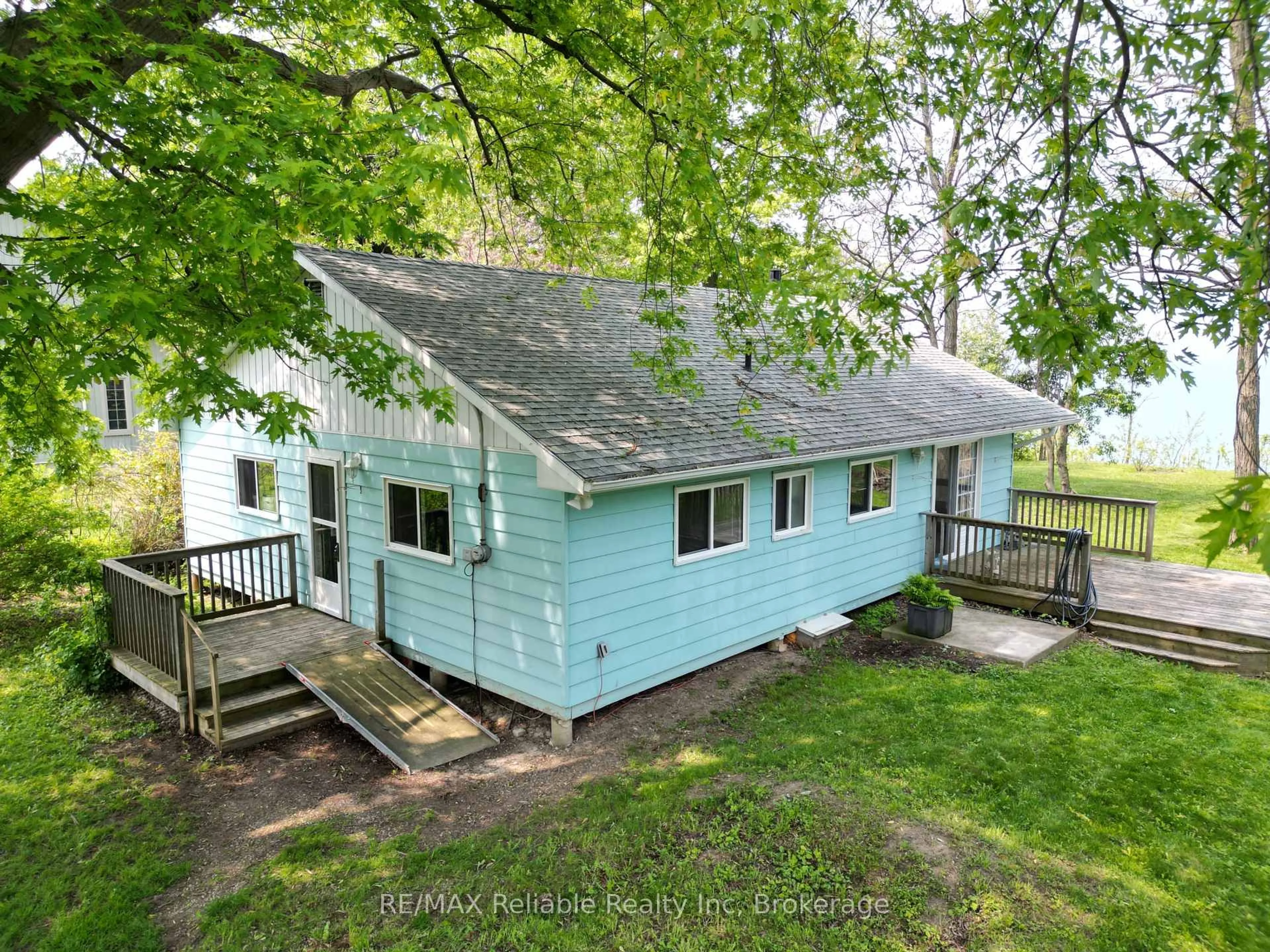 A pic from outside/outdoor area/front of a property/back of a property/a pic from drone, unknown for 77543 Melena Dr, Bluewater Ontario N0M 1G0