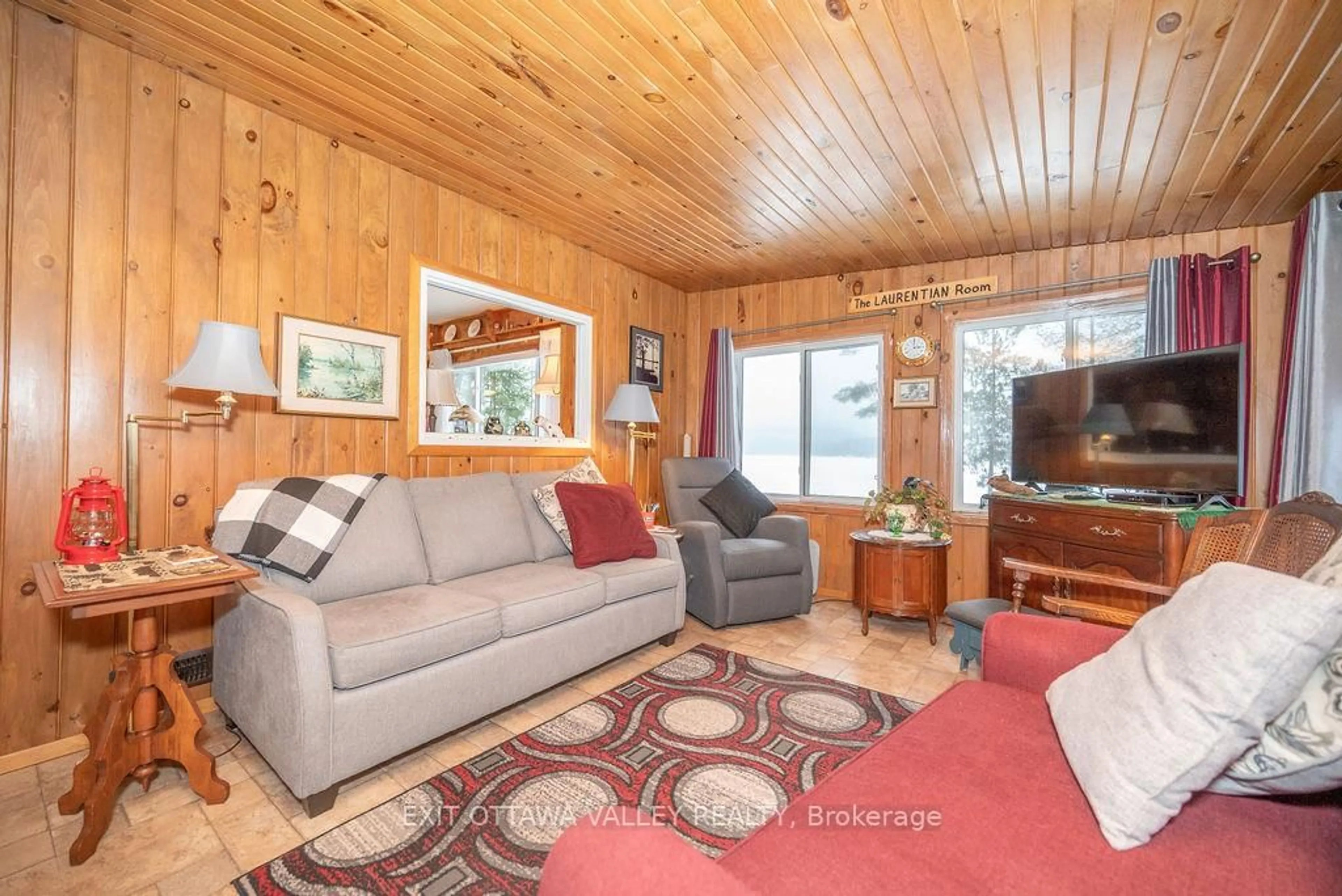 Living room with furniture, wood/laminate floor for 51 Myrlin Way, Deep River Ontario K0J 1P0