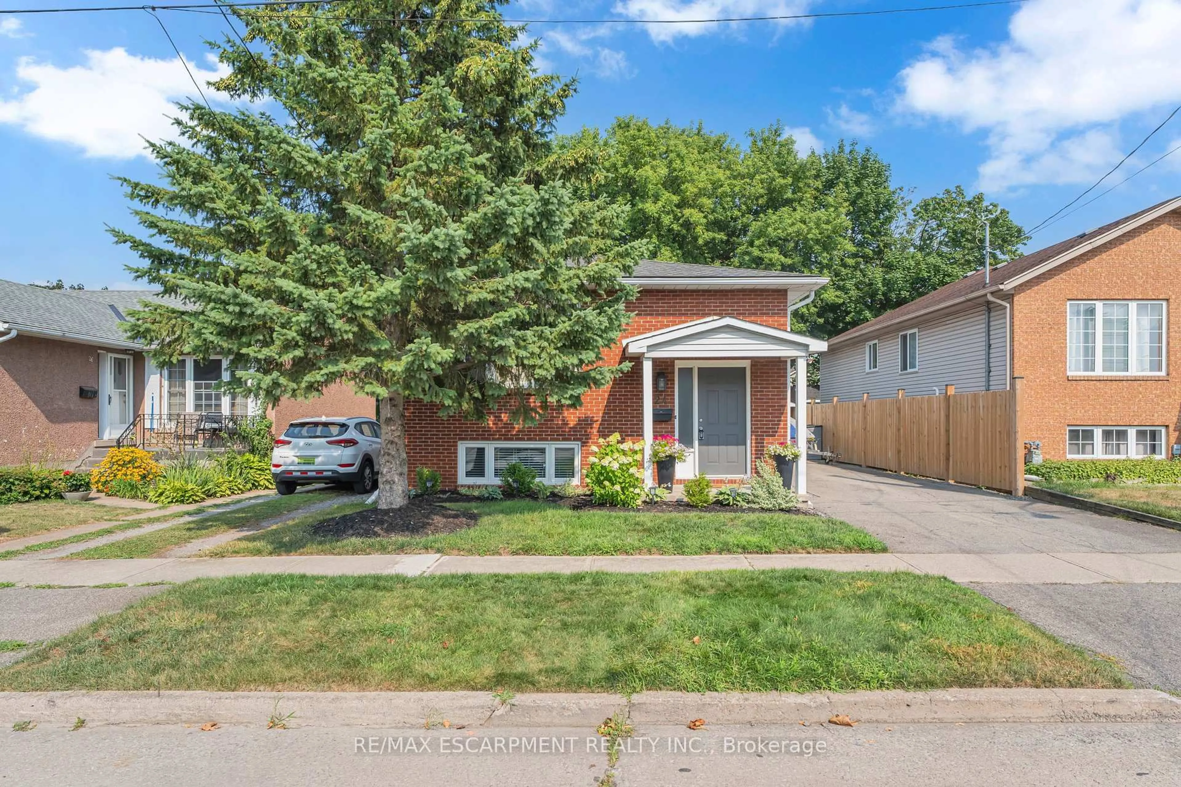 Home with brick exterior material, street for 24 Augusta Ave, St. Catharines Ontario L2M 5R2