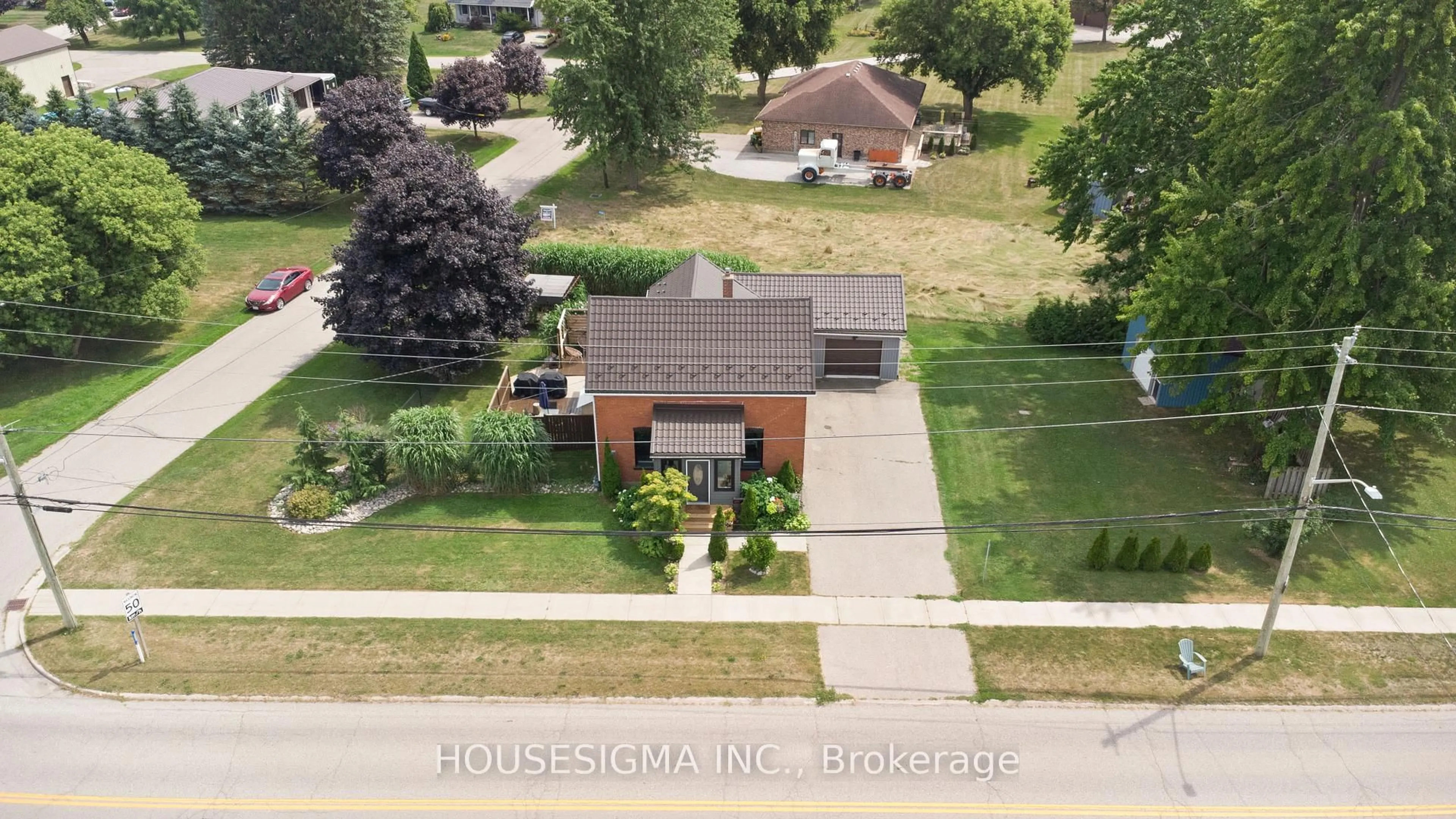 A pic from outside/outdoor area/front of a property/back of a property/a pic from drone, street for 51017 Ron McNeil Line, Malahide Ontario N0L 2J0