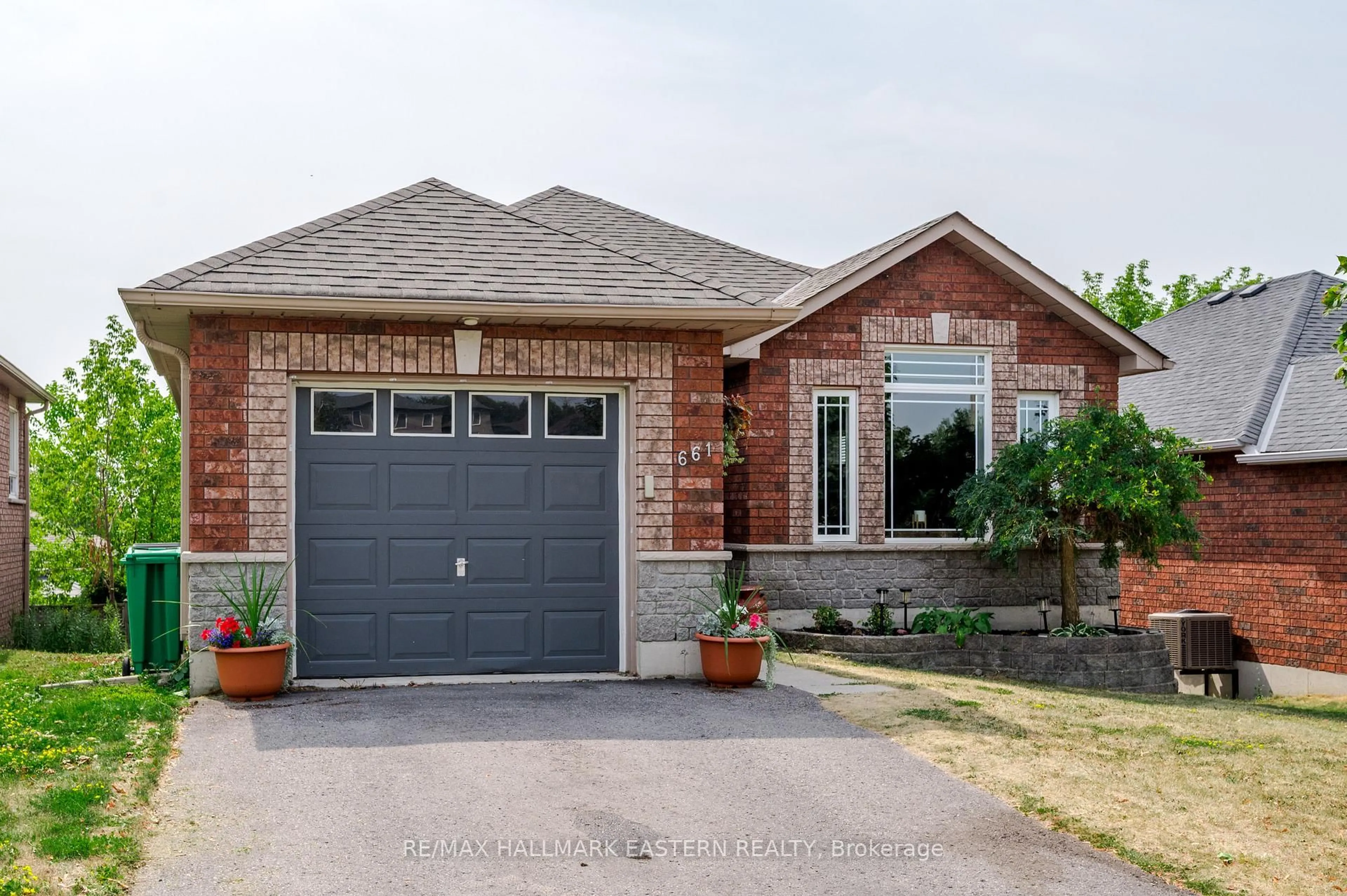 Home with brick exterior material, street for 661 Trailview Dr, Peterborough South Ontario K9J 8P1