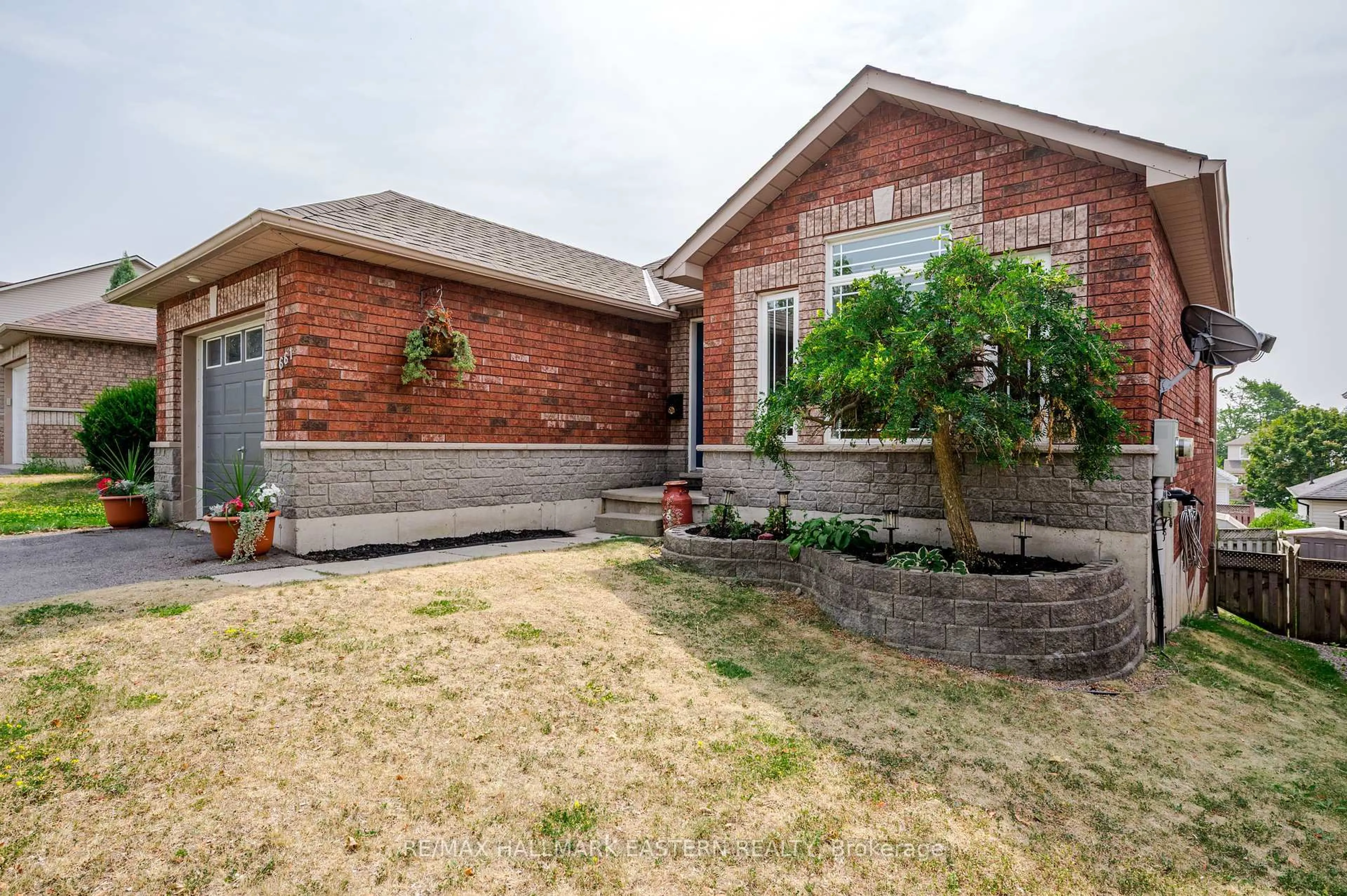 Home with brick exterior material, street for 661 Trailview Dr, Peterborough South Ontario K9J 8P1