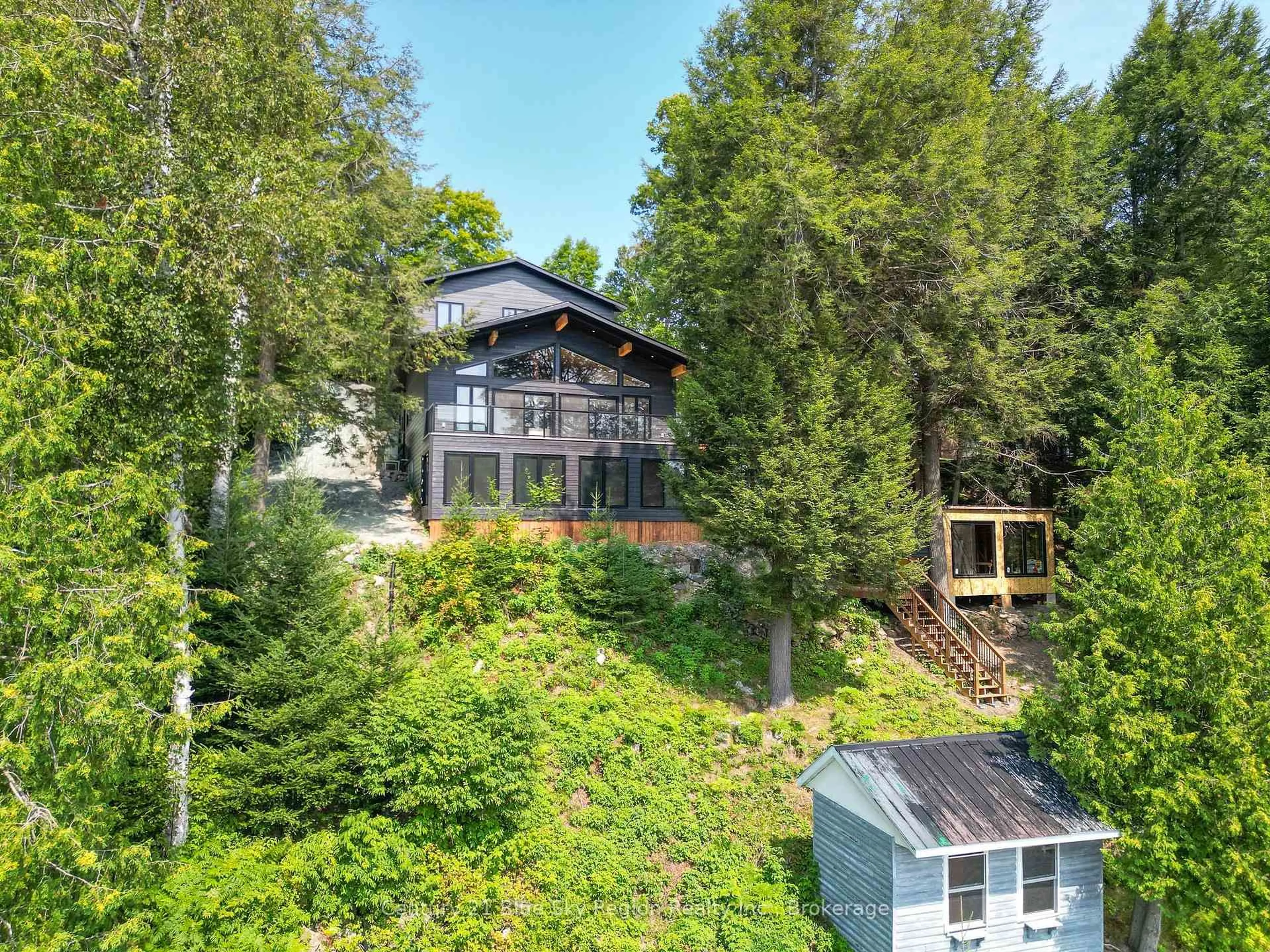 A pic from outside/outdoor area/front of a property/back of a property/a pic from drone, unknown for 1951 E Peninsula Rd, North Bay Ontario P1B 8G4