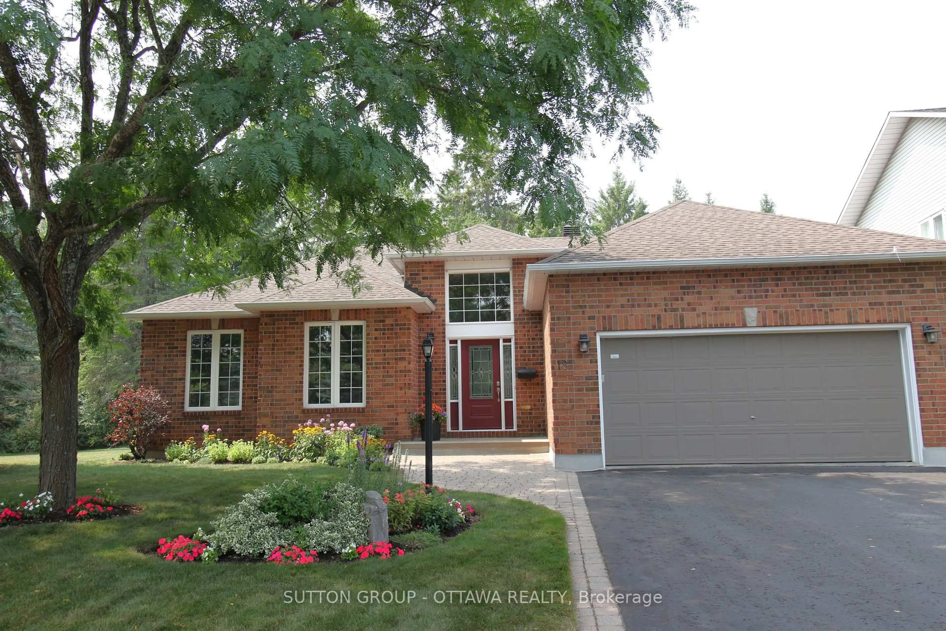 Home with brick exterior material, street for 18 Sirocco Cres, Stittsville Ontario K2S 1Z7
