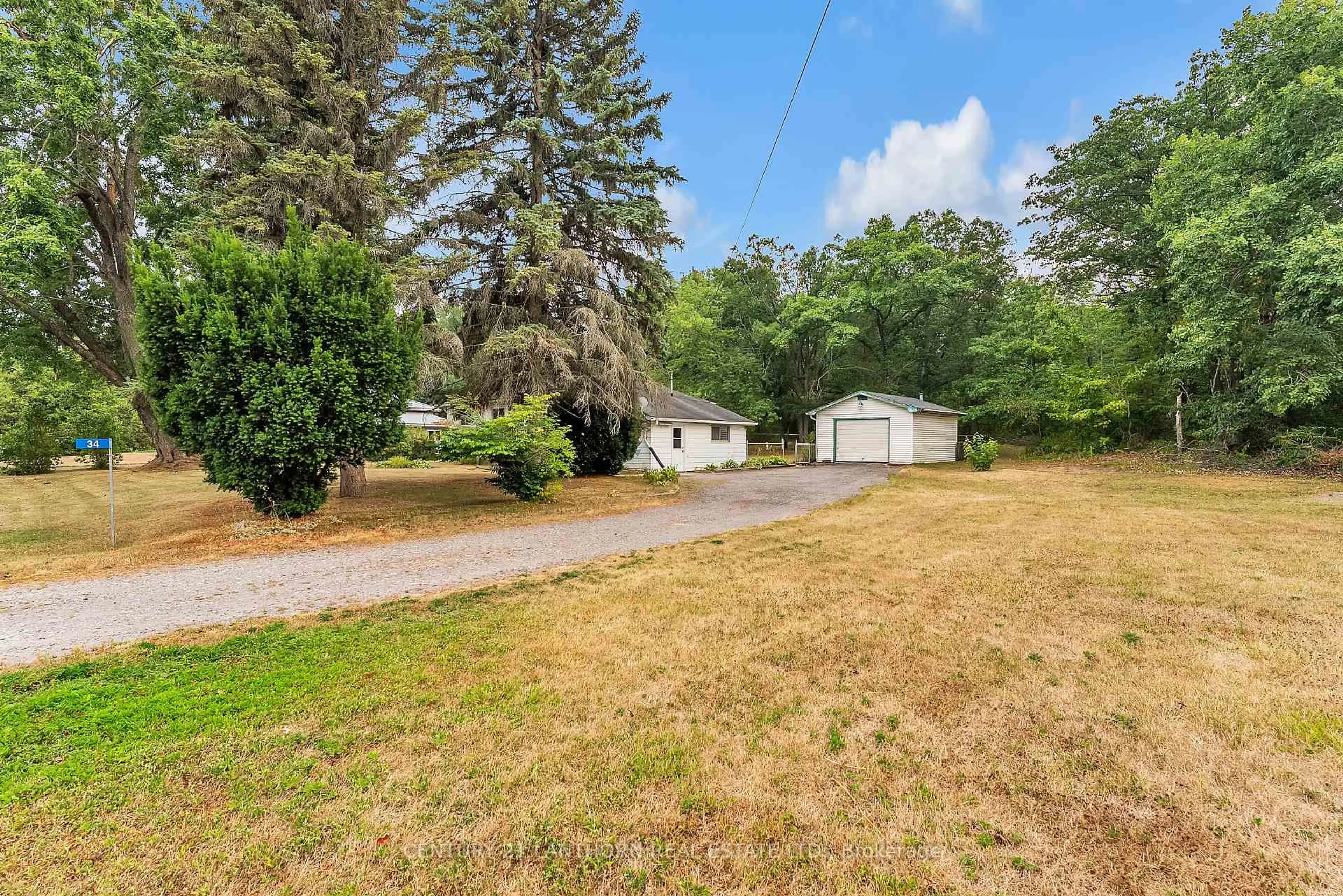 A pic from outside/outdoor area/front of a property/back of a property/a pic from drone, unknown for 34 Turncliffe Rd, Ingleside Ontario K8V 5P4