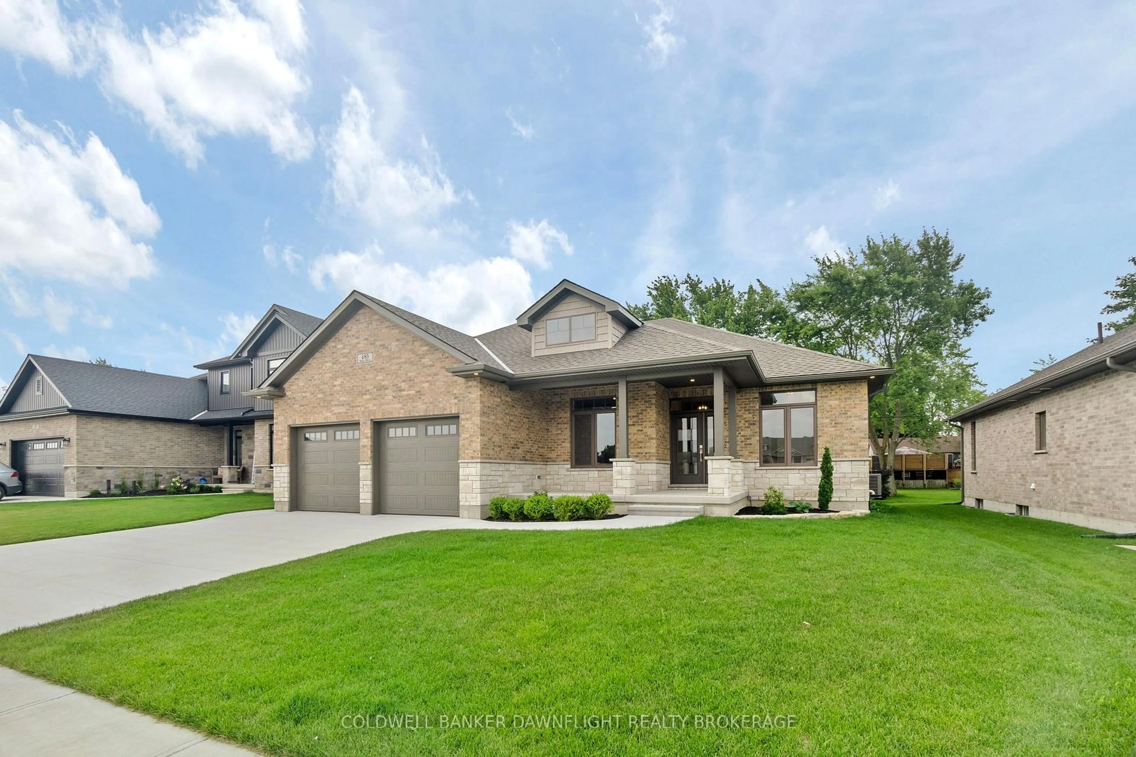 Home with brick exterior material, street for 483 Motz Blvd, South Huron Ontario N0M 1S1
