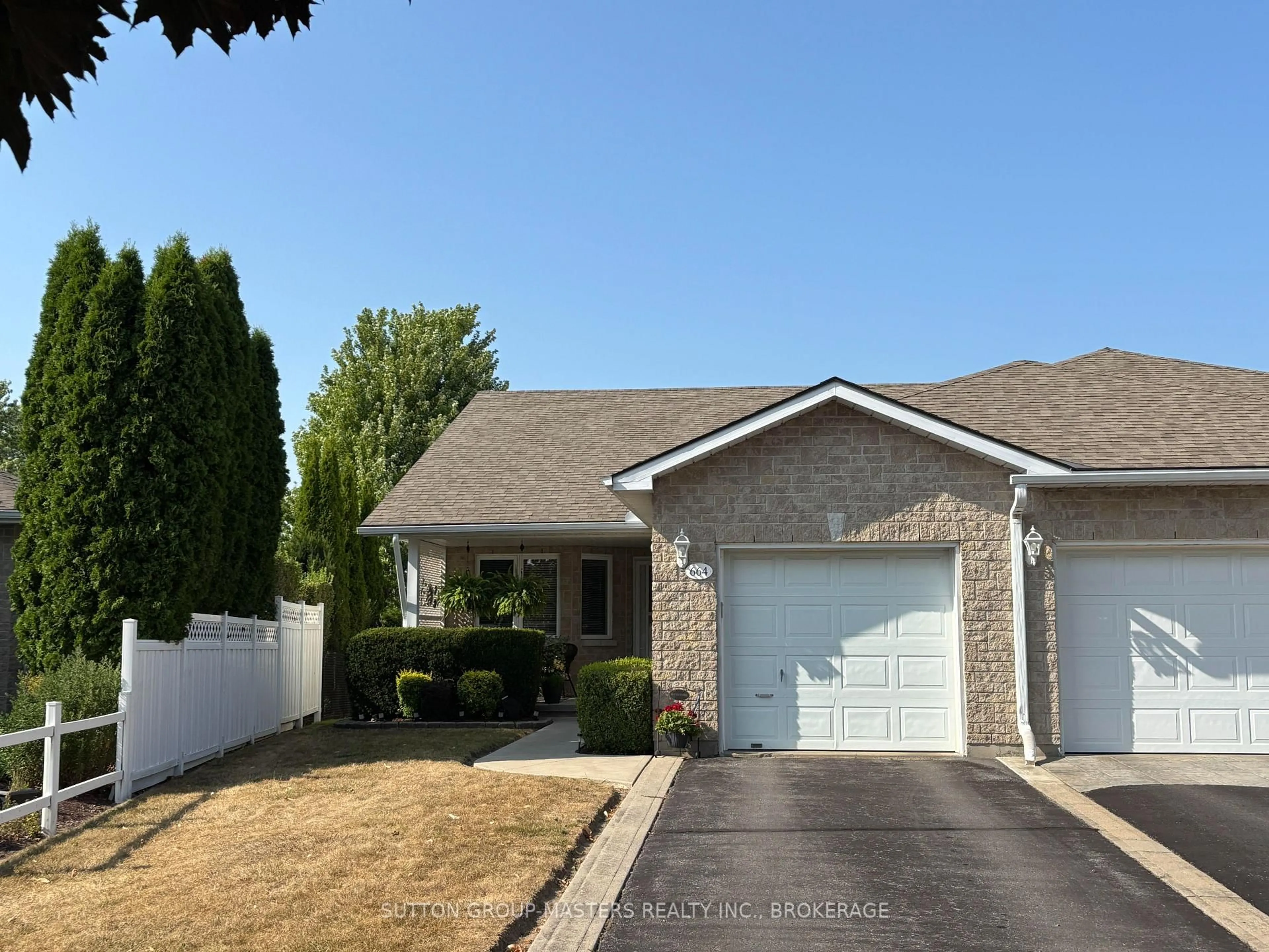 Home with vinyl exterior material, street for 664 Millwood Dr, Kingston Ontario K7M 8Z1