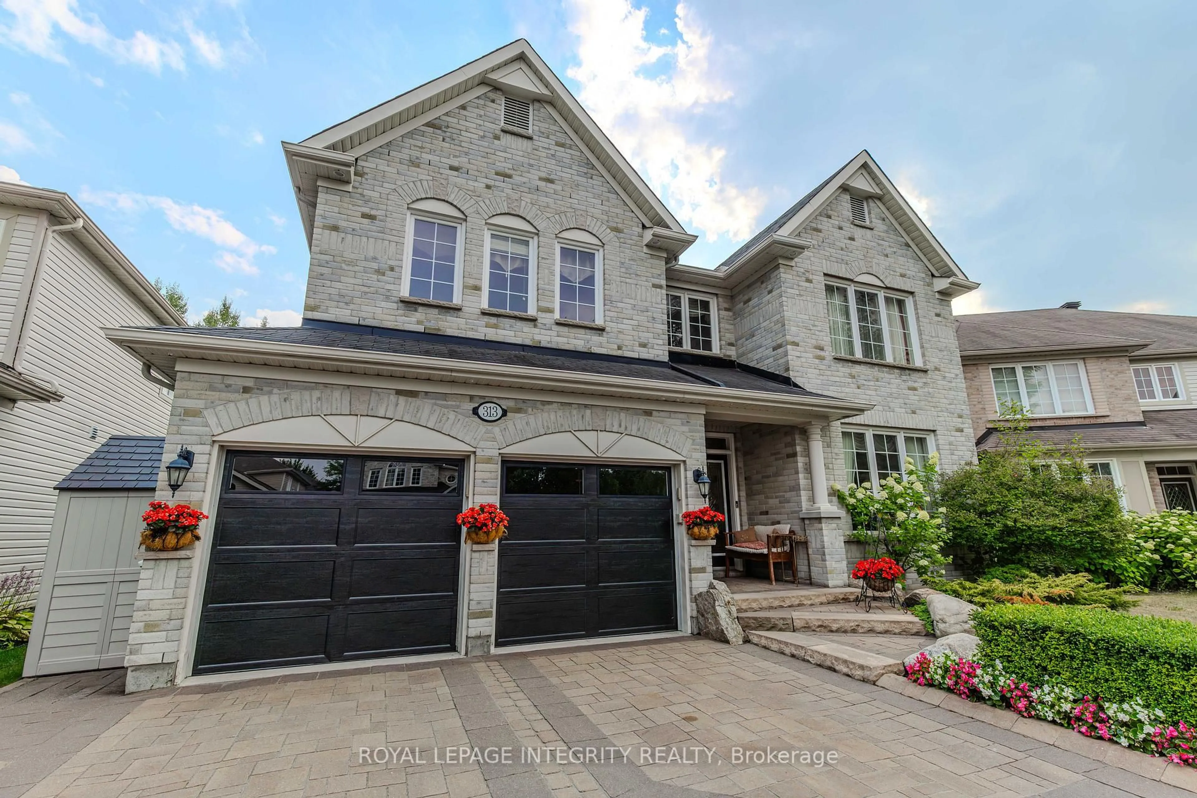 Home with brick exterior material, street for 313 Eckerson Ave, Ottawa Ontario K2S 0K8