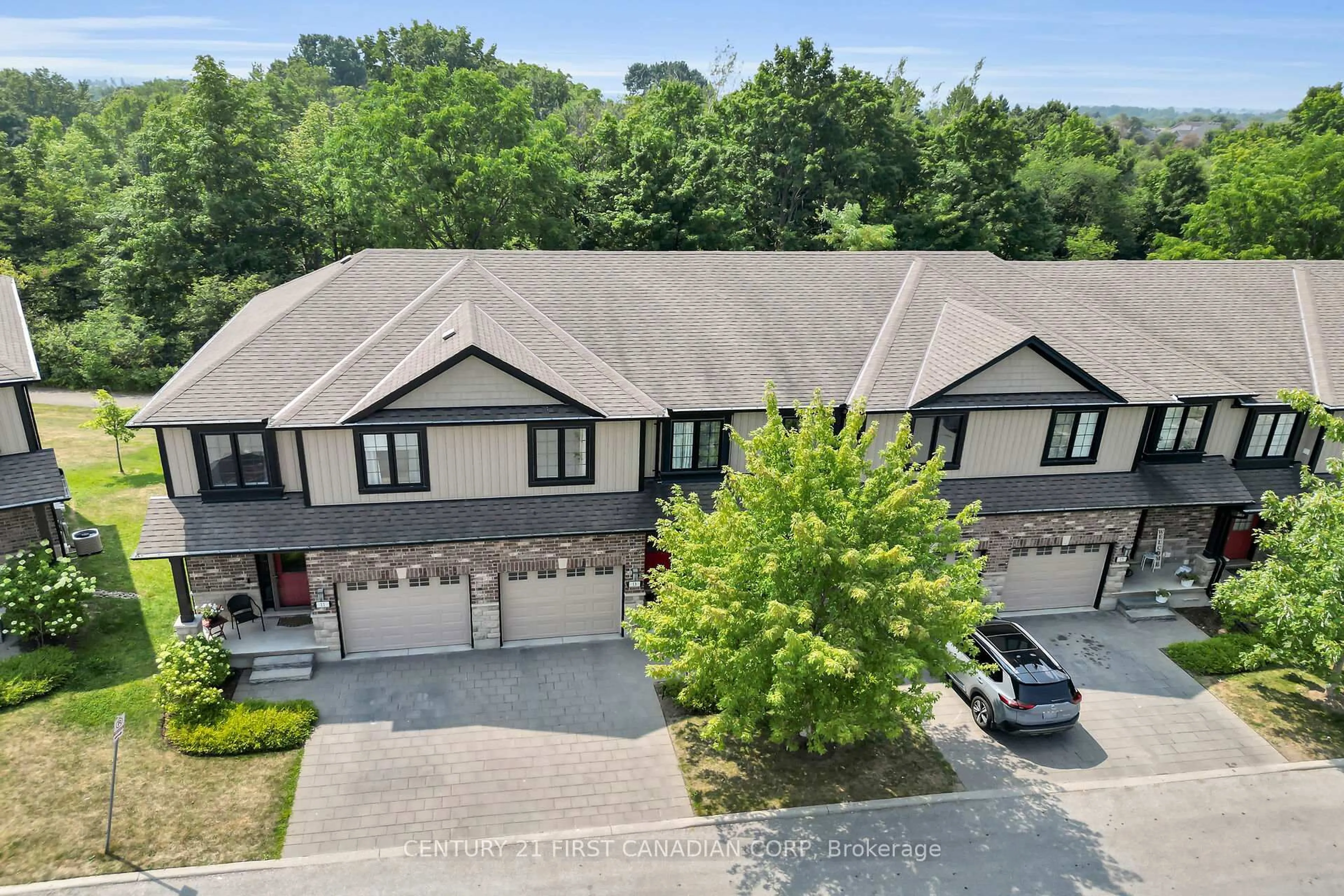 A pic from outside/outdoor area/front of a property/back of a property/a pic from drone, street for 2235 Blackwater Rd #13, London North Ontario N5Y 0L8