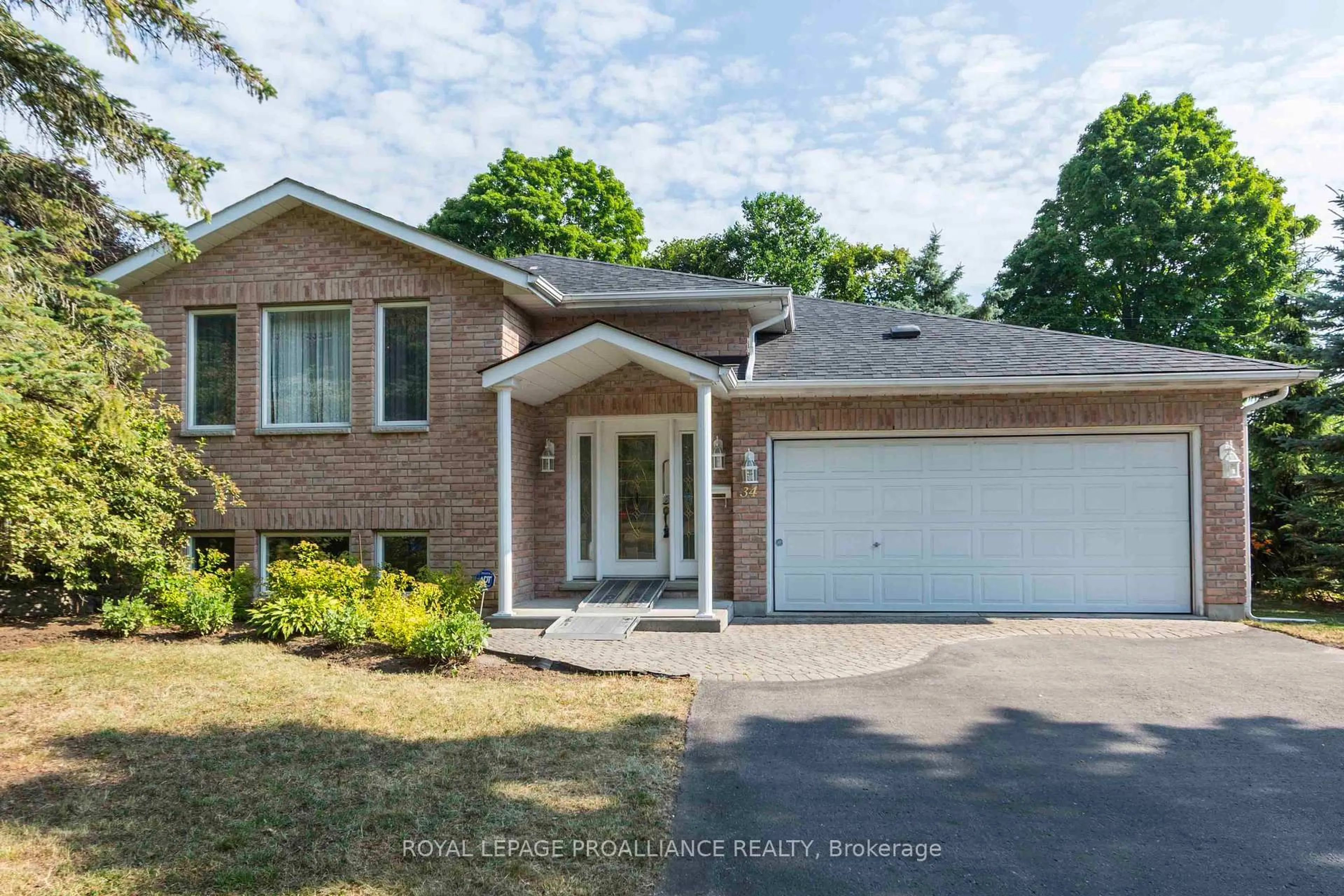 Home with brick exterior material, street for 34 Edgeview Dr, Quinte West Ontario K8V 3G4