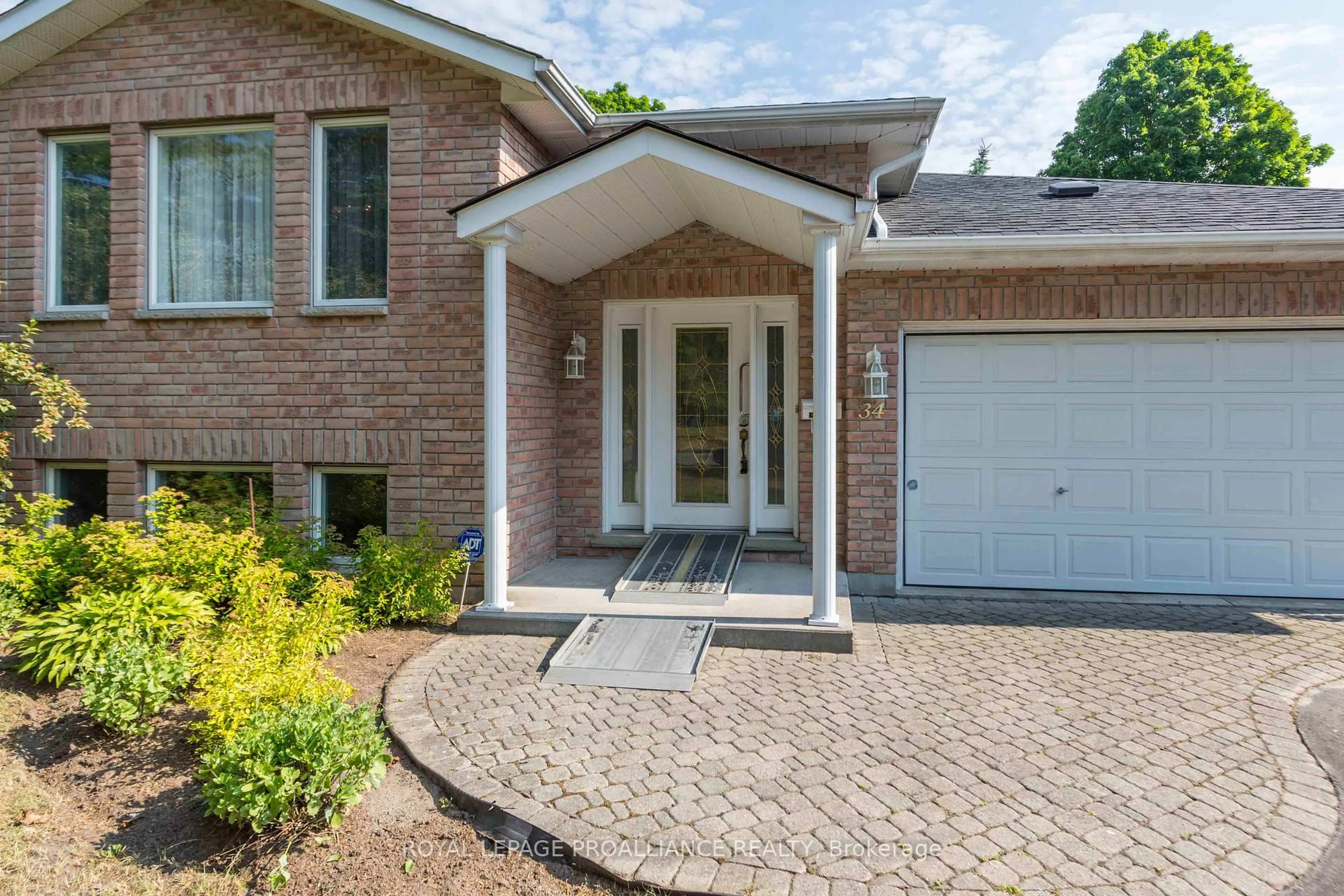 Home with brick exterior material, street for 34 Edgeview Dr, Quinte West Ontario K8V 3G4
