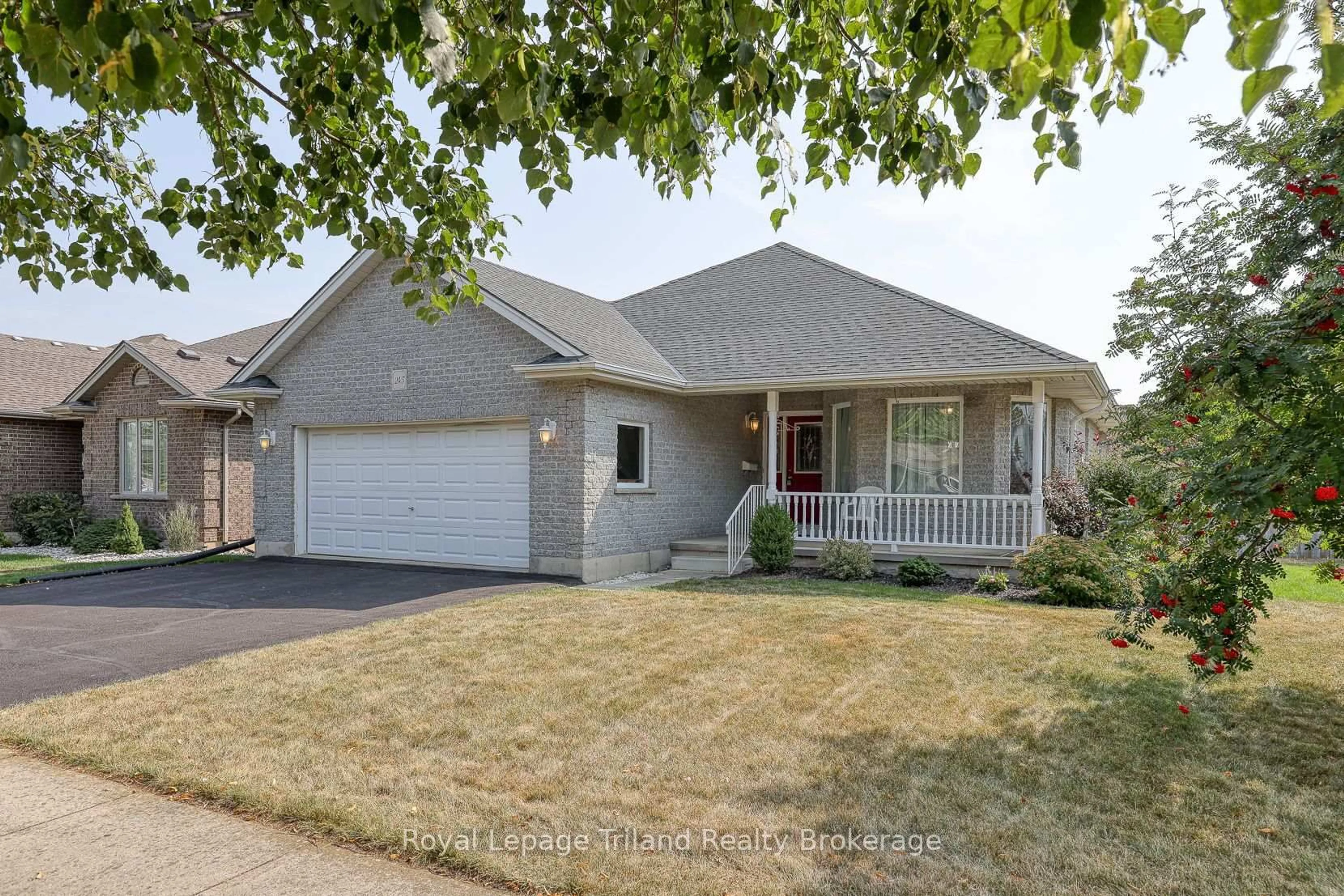 Home with brick exterior material, street for 245 Falcon Dr, Woodstock Ontario N4T 0A1