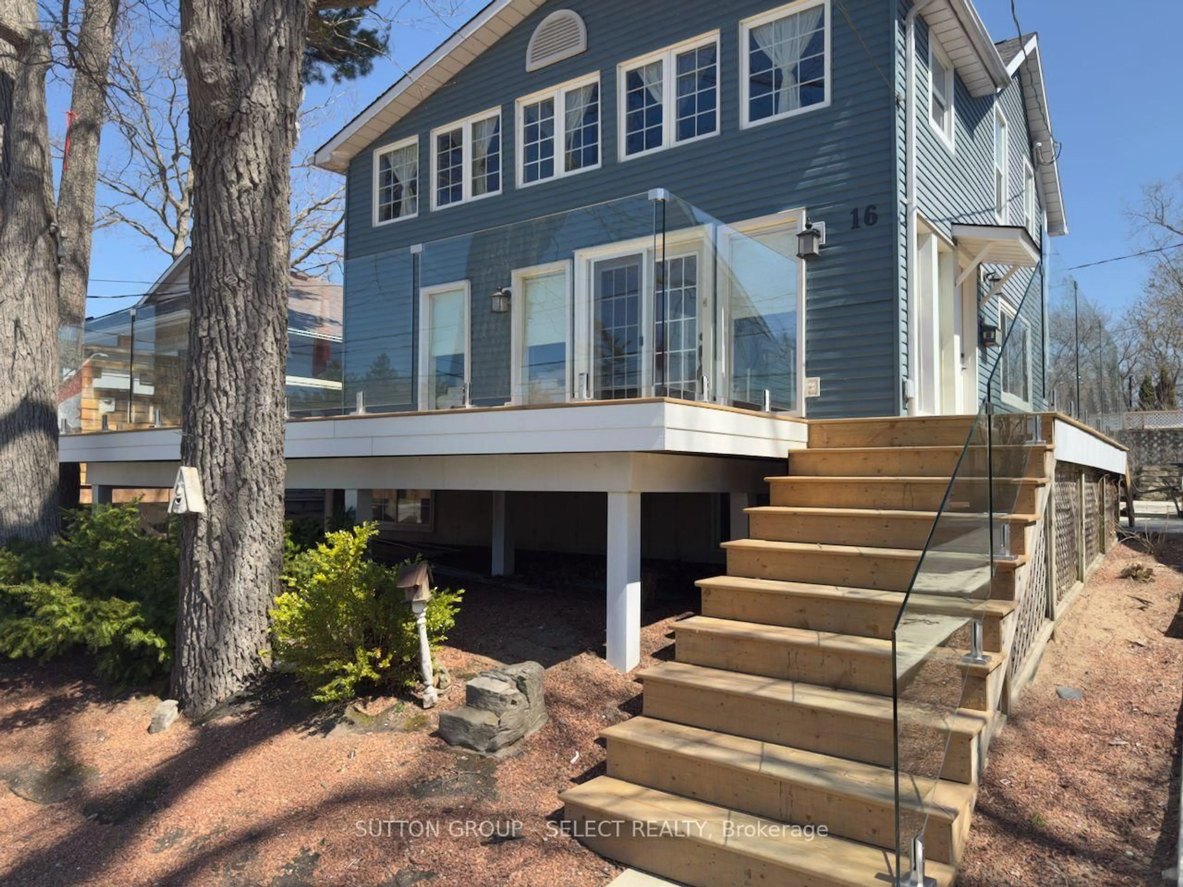 Home with vinyl exterior material, street for 16 Huron Ave, Lambton Shores Ontario N0M 1T0