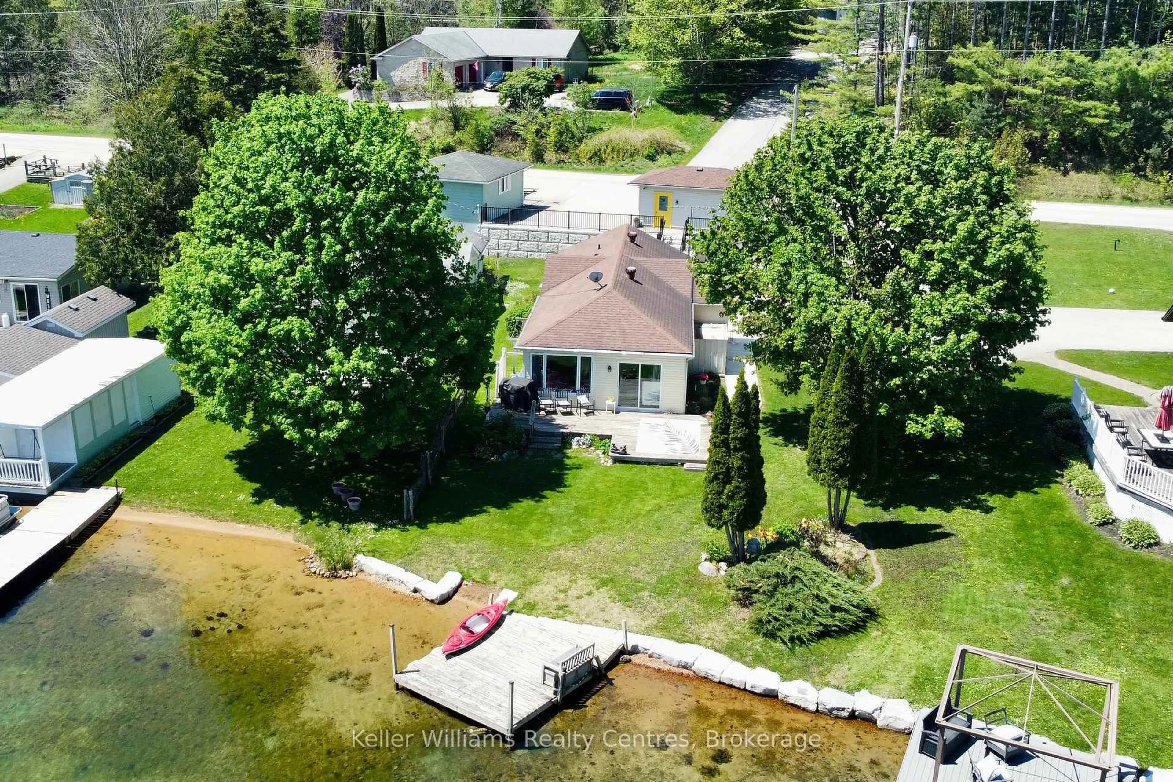 A pic from outside/outdoor area/front of a property/back of a property/a pic from drone, water/lake/river/ocean view for 419 Lake Rosalind Road 4, Brockton Ontario N4N 3B9