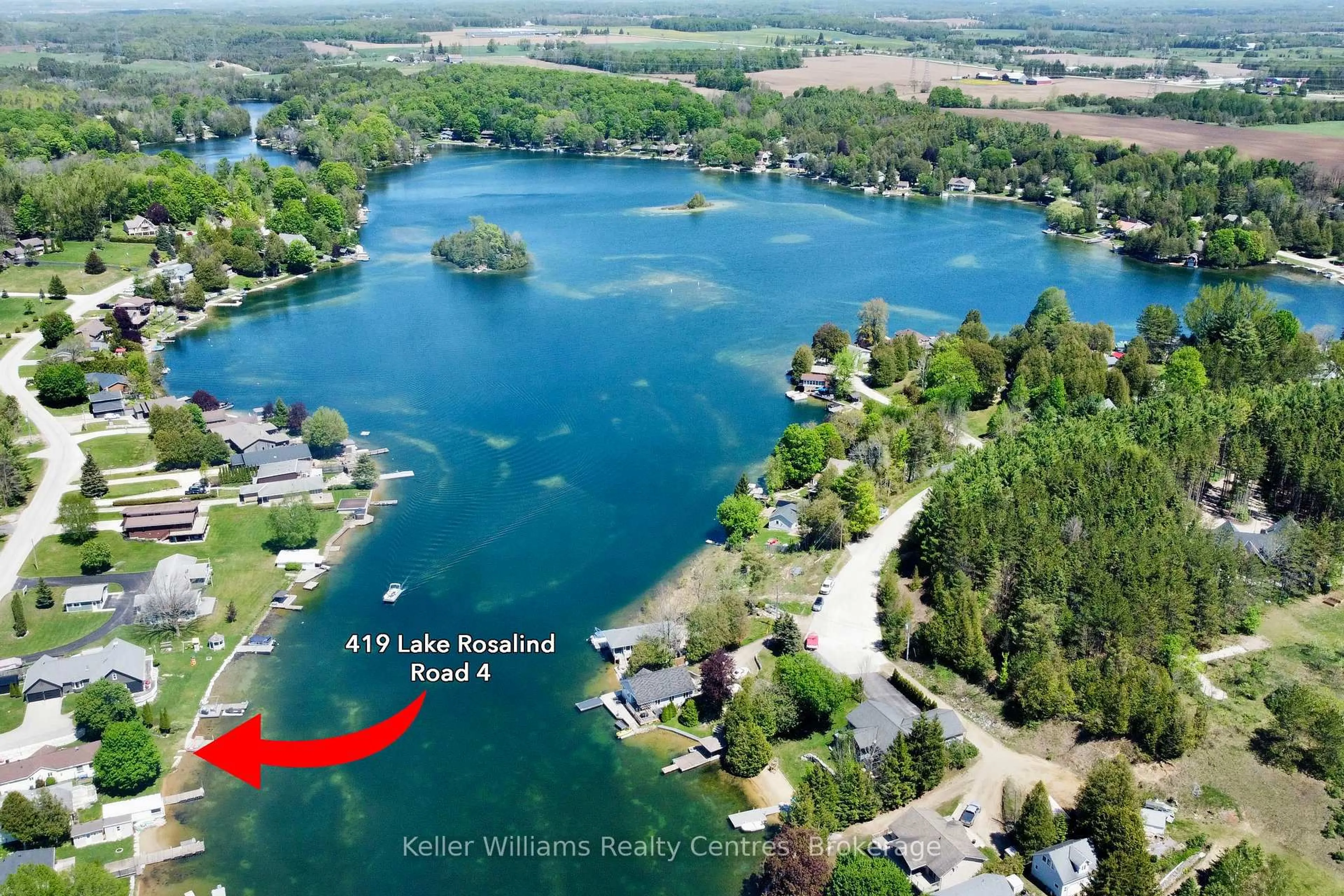 A pic from outside/outdoor area/front of a property/back of a property/a pic from drone, water/lake/river/ocean view for 419 Lake Rosalind Road 4, Brockton Ontario N4N 3B9