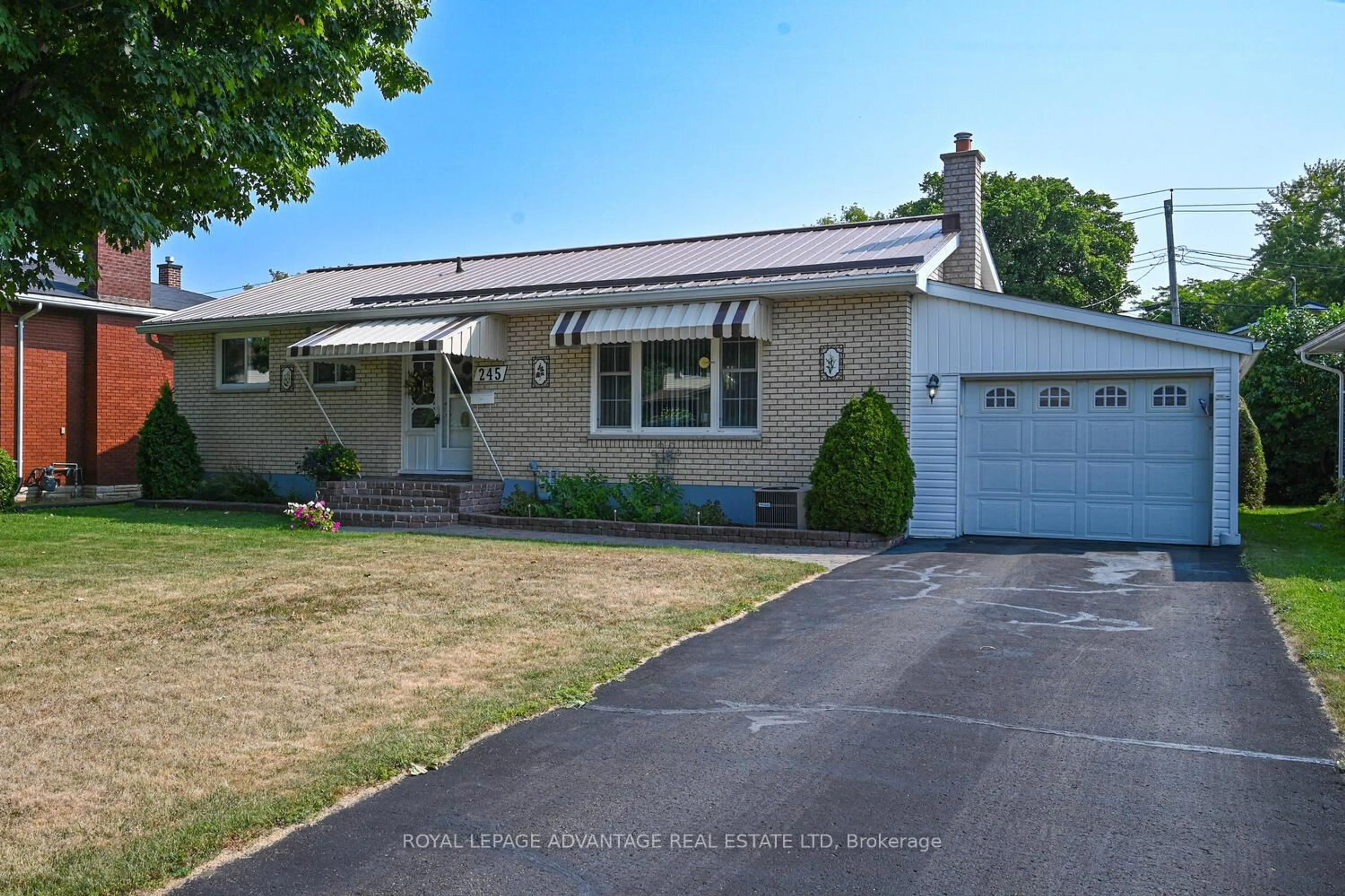 Home with vinyl exterior material, street for 245 Allan St, Smiths Falls Ontario K7A 4M9