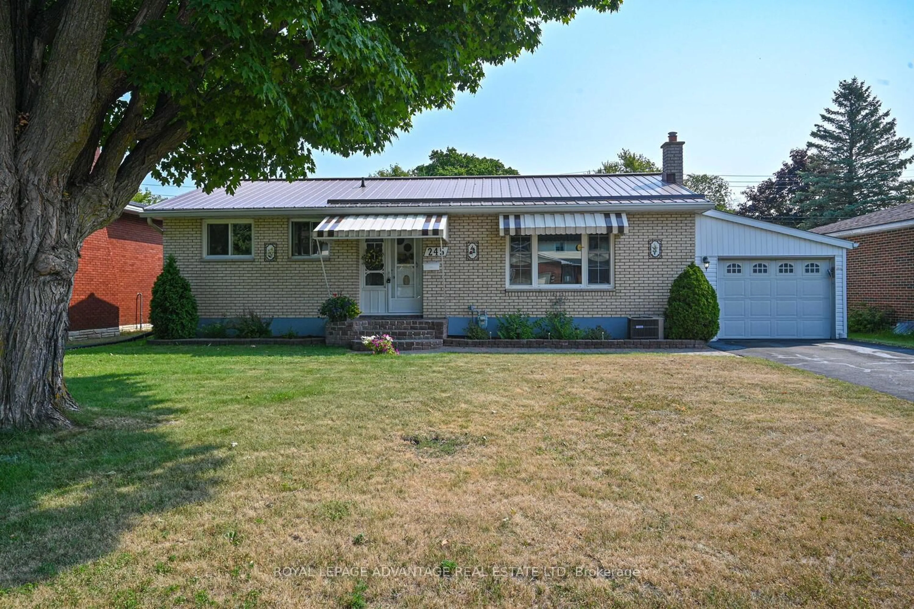 Home with vinyl exterior material, street for 245 Allan St, Smiths Falls Ontario K7A 4M9