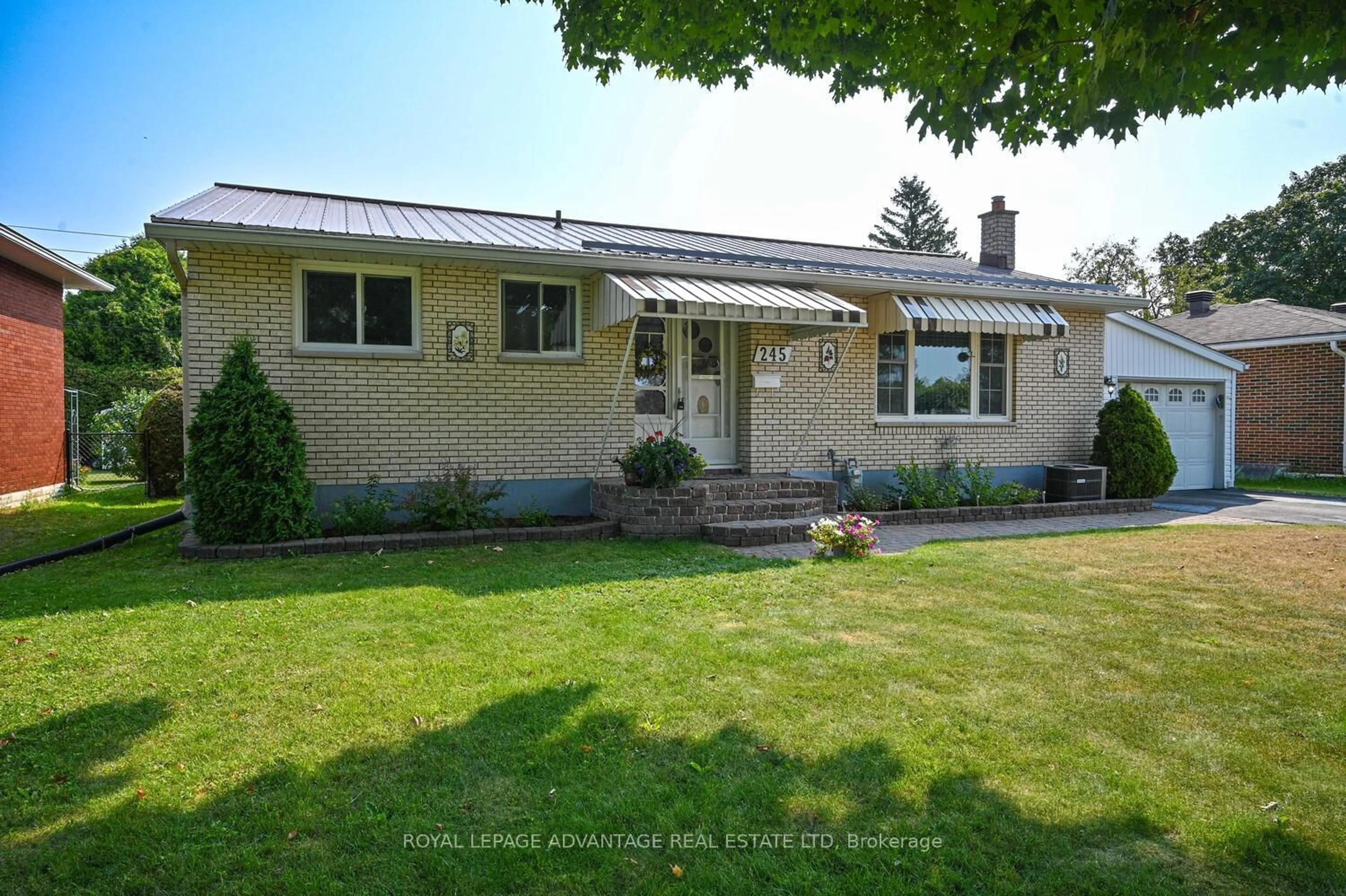 Home with vinyl exterior material, street for 245 Allan St, Smiths Falls Ontario K7A 4M9