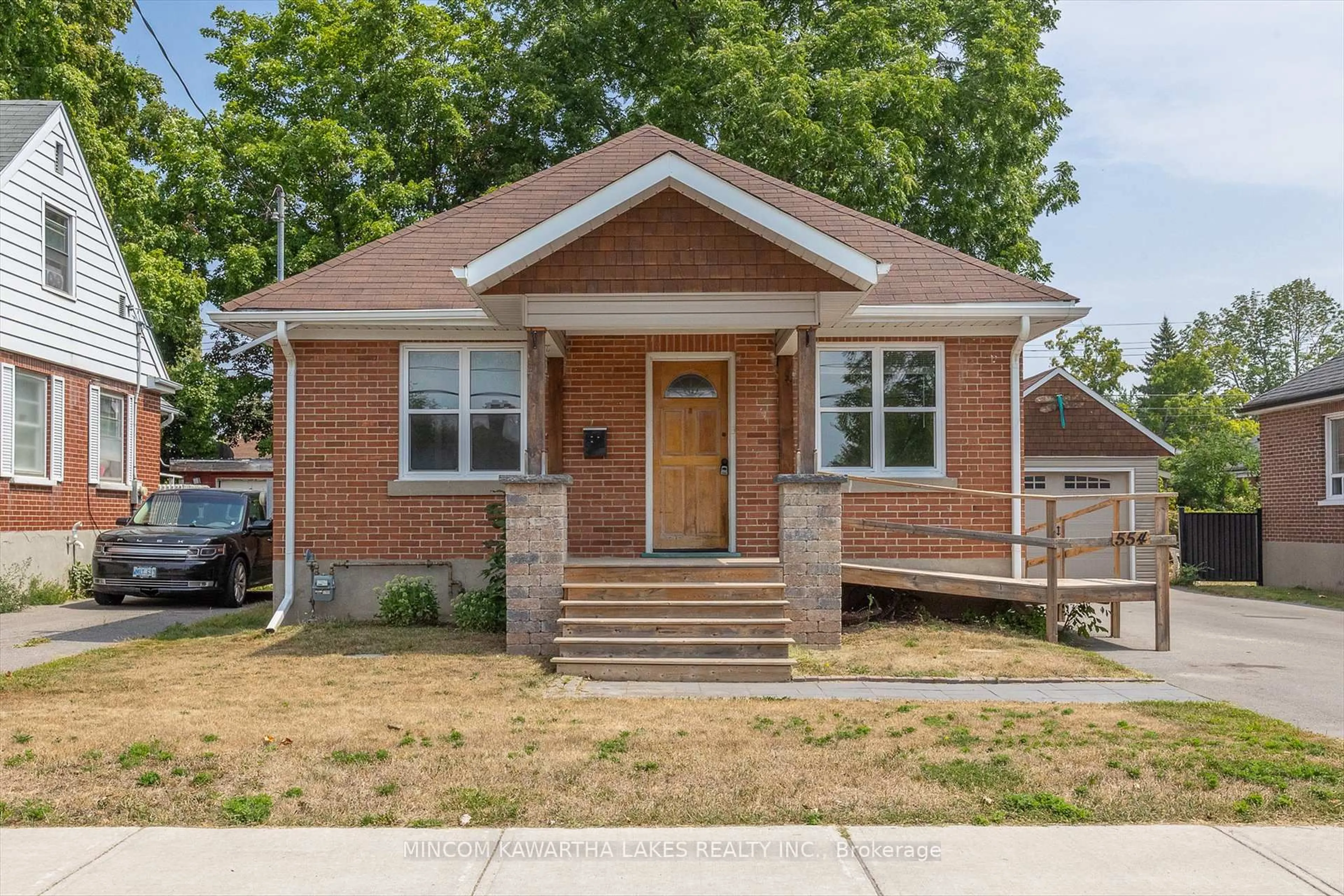 Home with brick exterior material, street for 554 Monaghan Rd, Peterborough South Ontario K9J 5H7