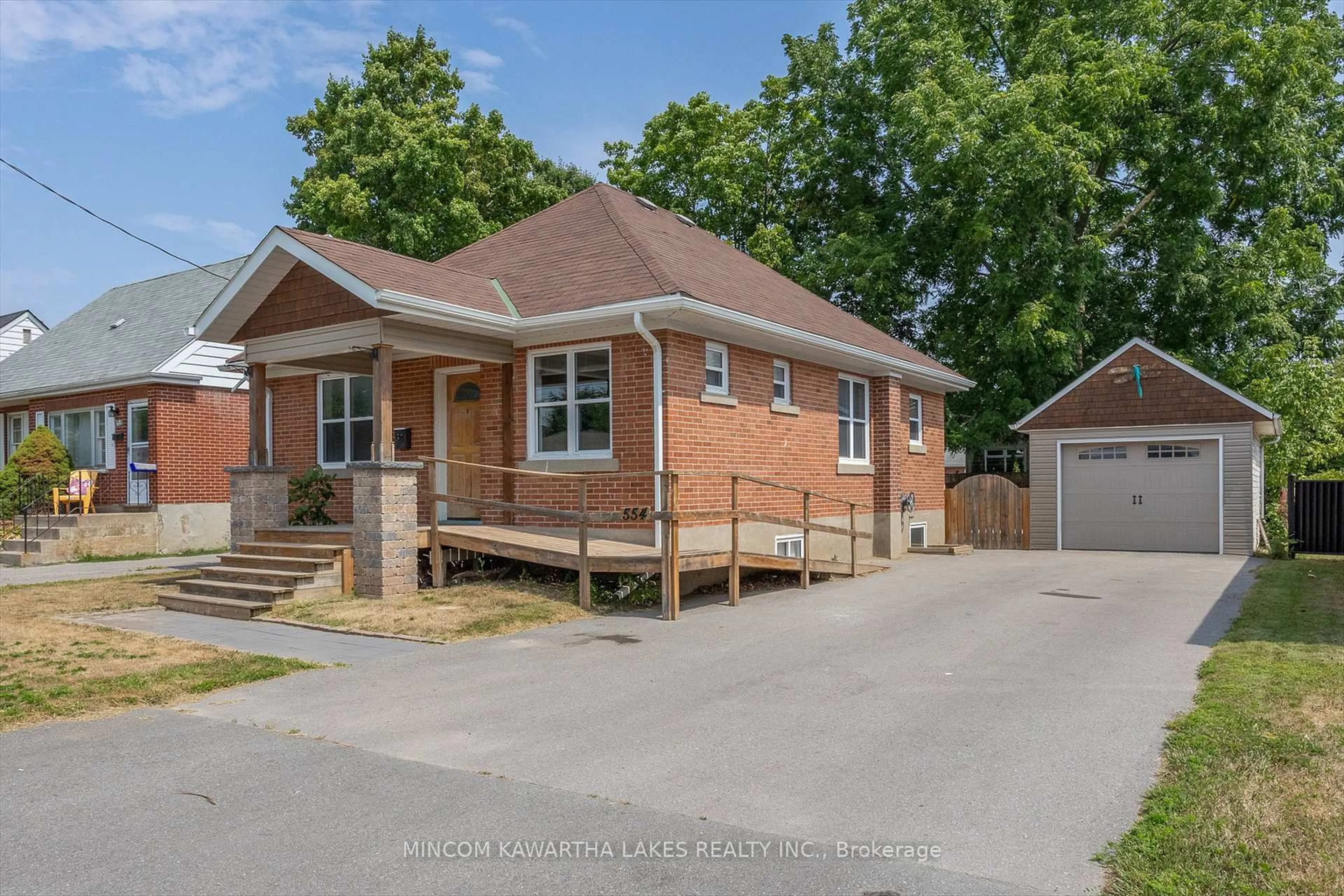 Home with brick exterior material, street for 554 Monaghan Rd, Peterborough South Ontario K9J 5H7