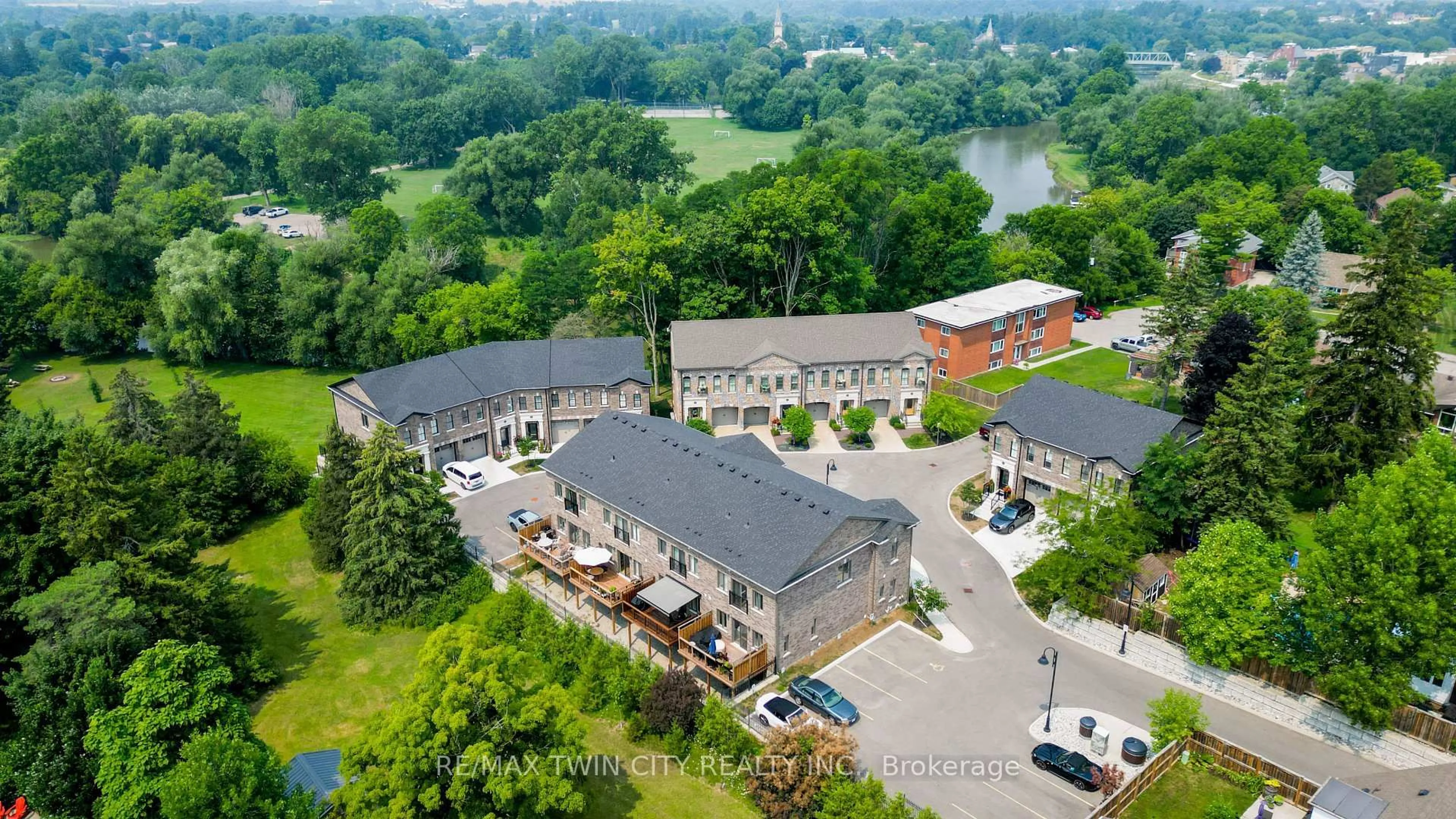 A pic from outside/outdoor area/front of a property/back of a property/a pic from drone, unknown for 362 Fairview St #103, Wilmot Ontario N3A 1M2