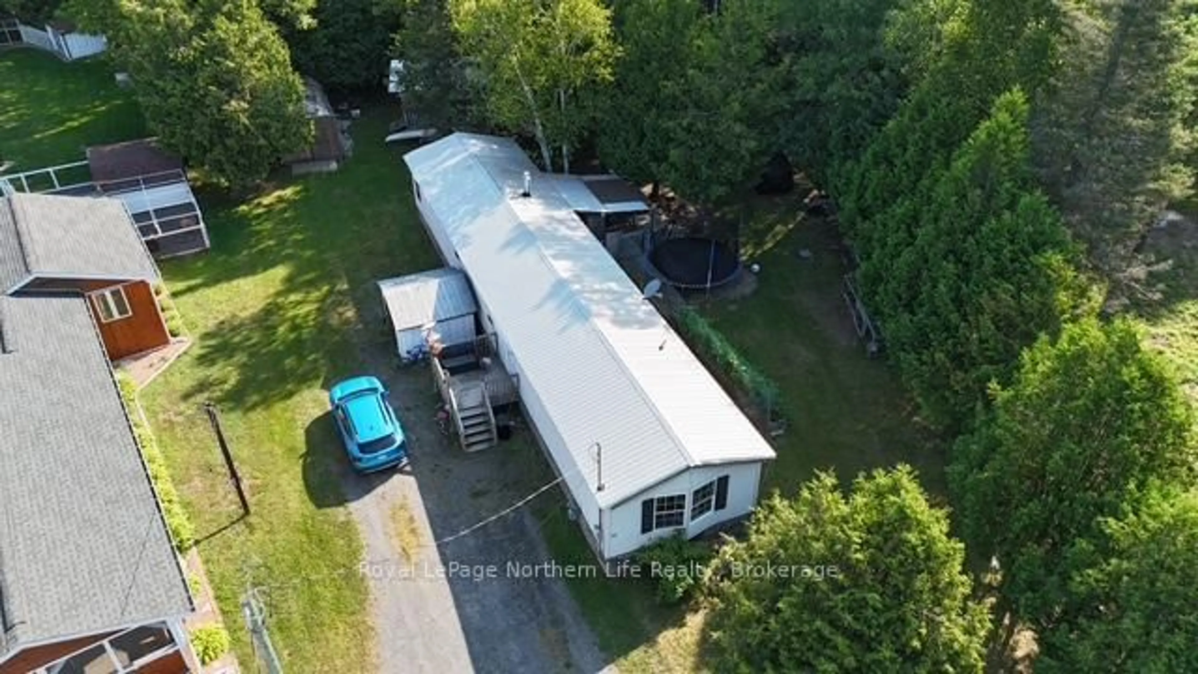 A pic from outside/outdoor area/front of a property/back of a property/a pic from drone, building for 12 Hillcrest Dr, Temagami Ontario P0H 2H0