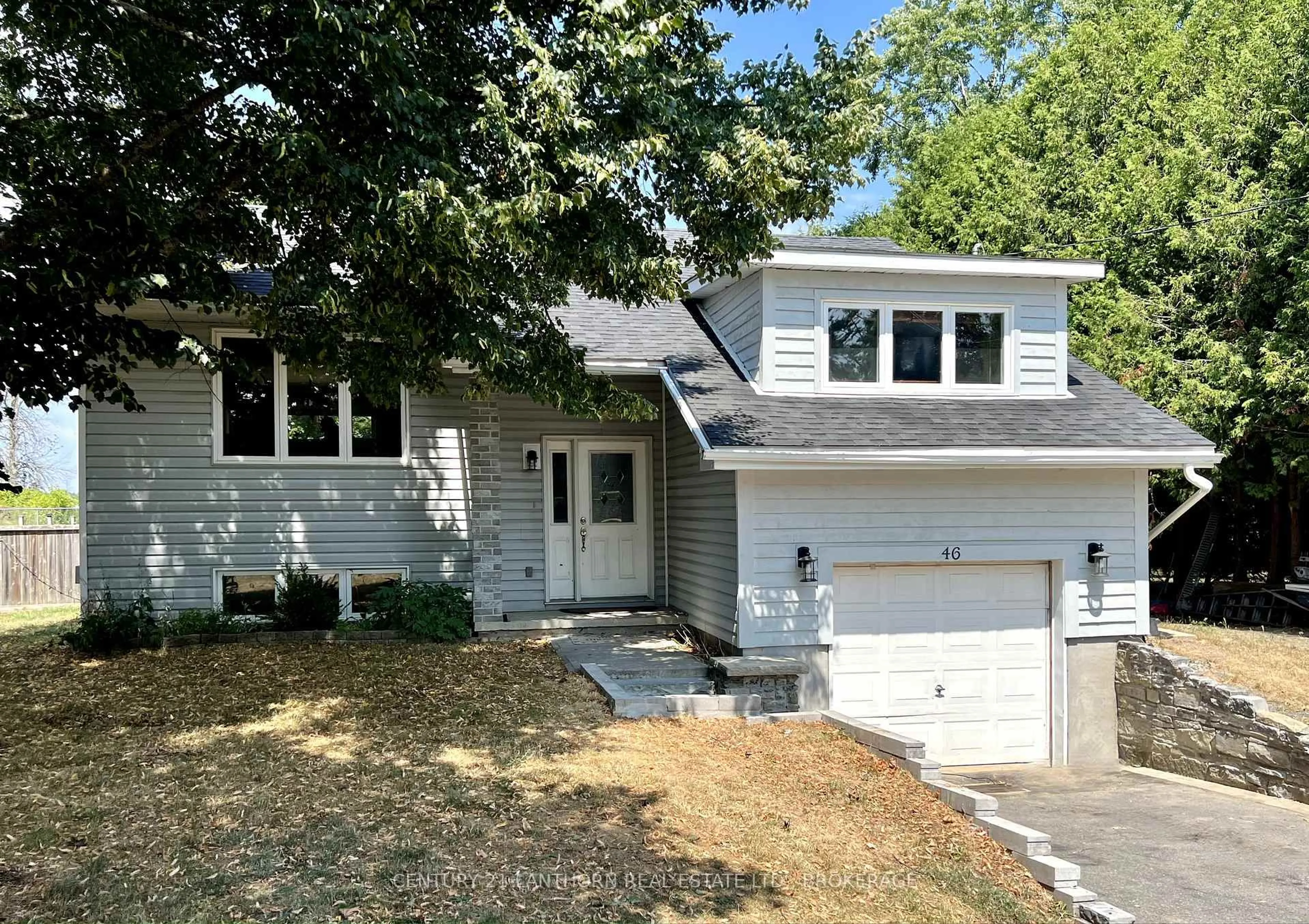 Home with vinyl exterior material, street for 46 Main St, Bissett Creek Ontario K0H 2H0
