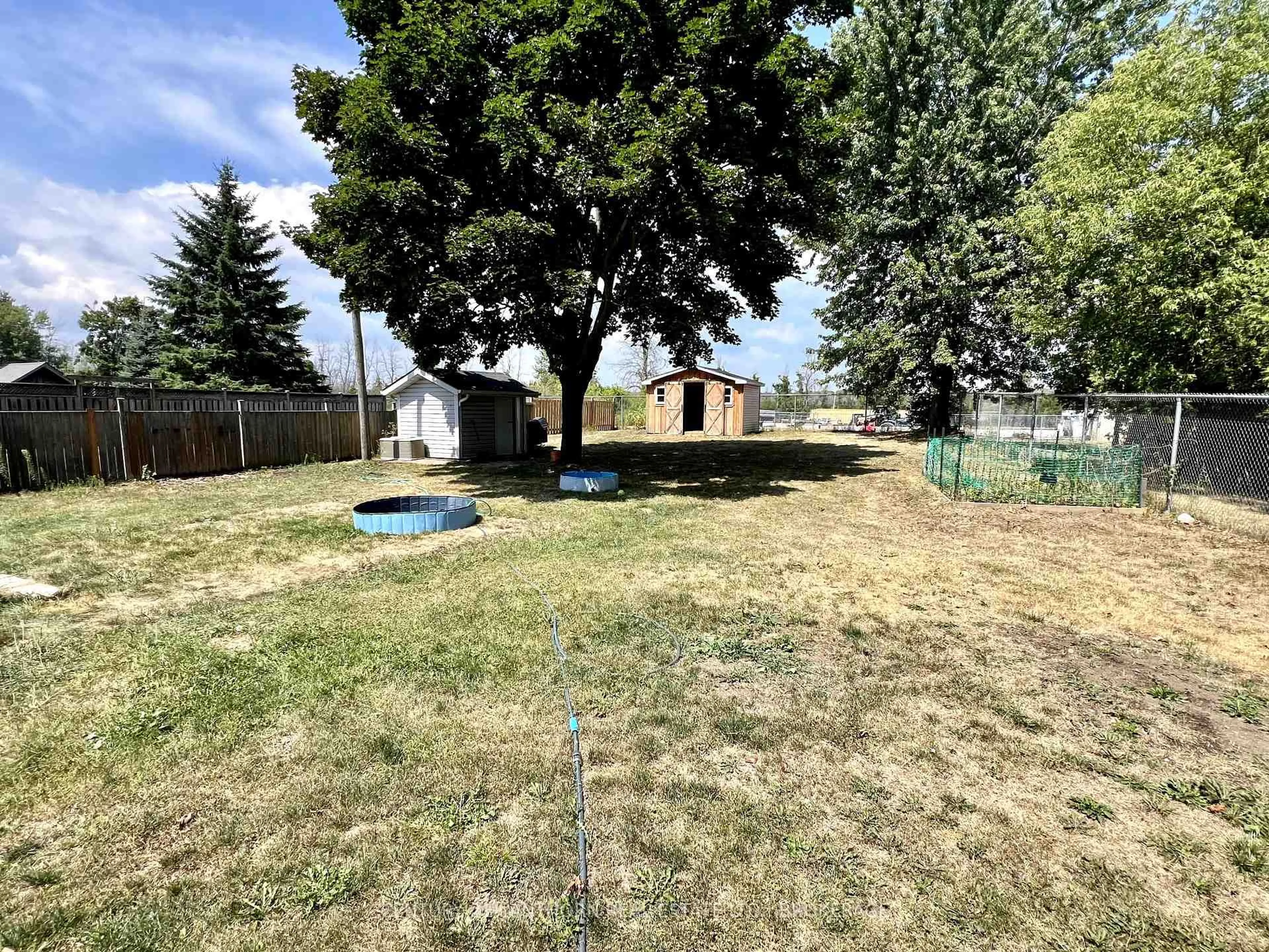 A pic from outside/outdoor area/front of a property/back of a property/a pic from drone, unknown for 46 Main St, Bissett Creek Ontario K0H 2H0