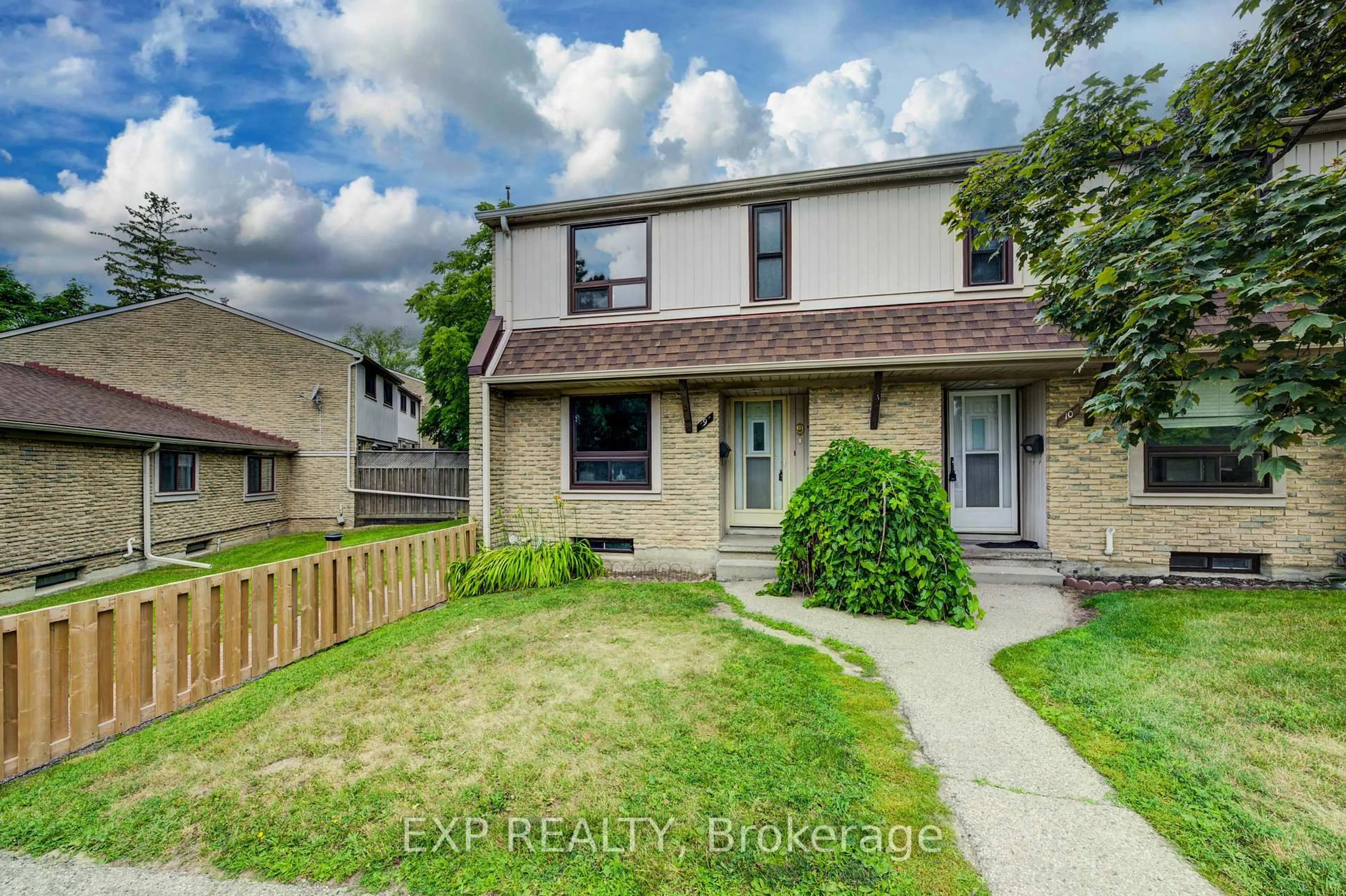 Home with vinyl exterior material, street for 280 Thaler Ave #9, Kitchener Ontario N2A 1R6