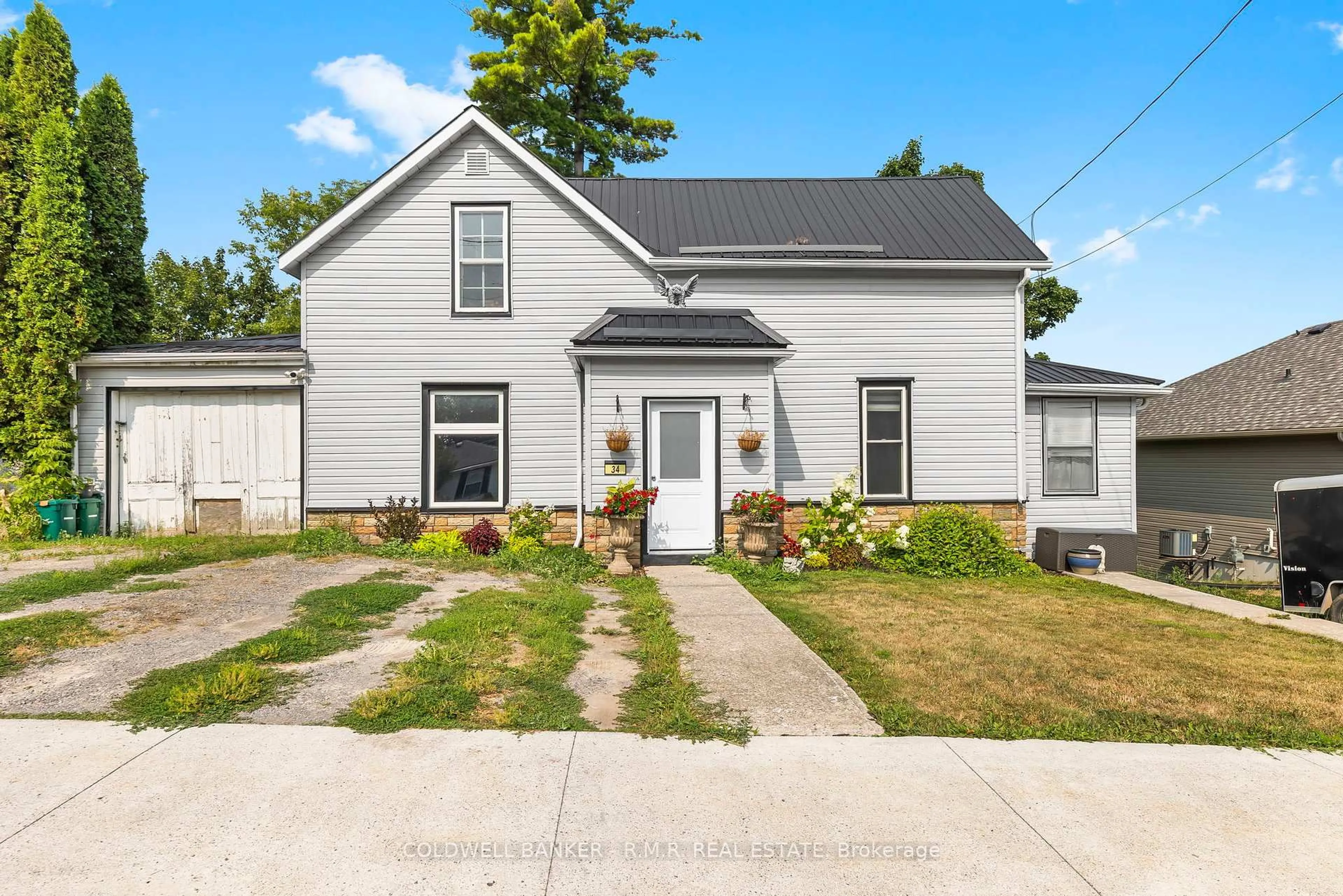 Home with vinyl exterior material, street for 34 Ranney St, Trent Hills Ontario K0L 1L0