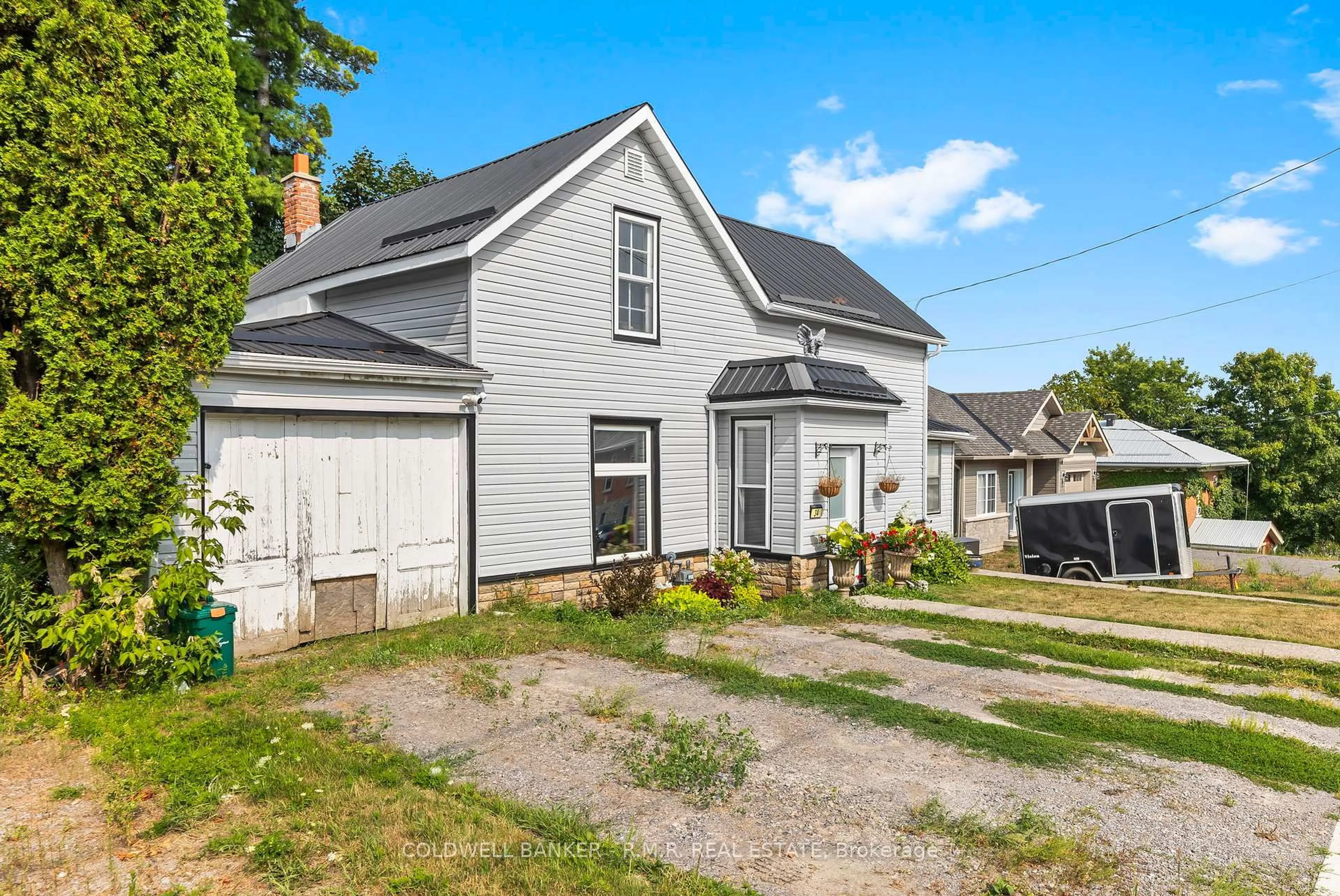 A pic from outside/outdoor area/front of a property/back of a property/a pic from drone, street for 34 Ranney St, Trent Hills Ontario K0L 1L0
