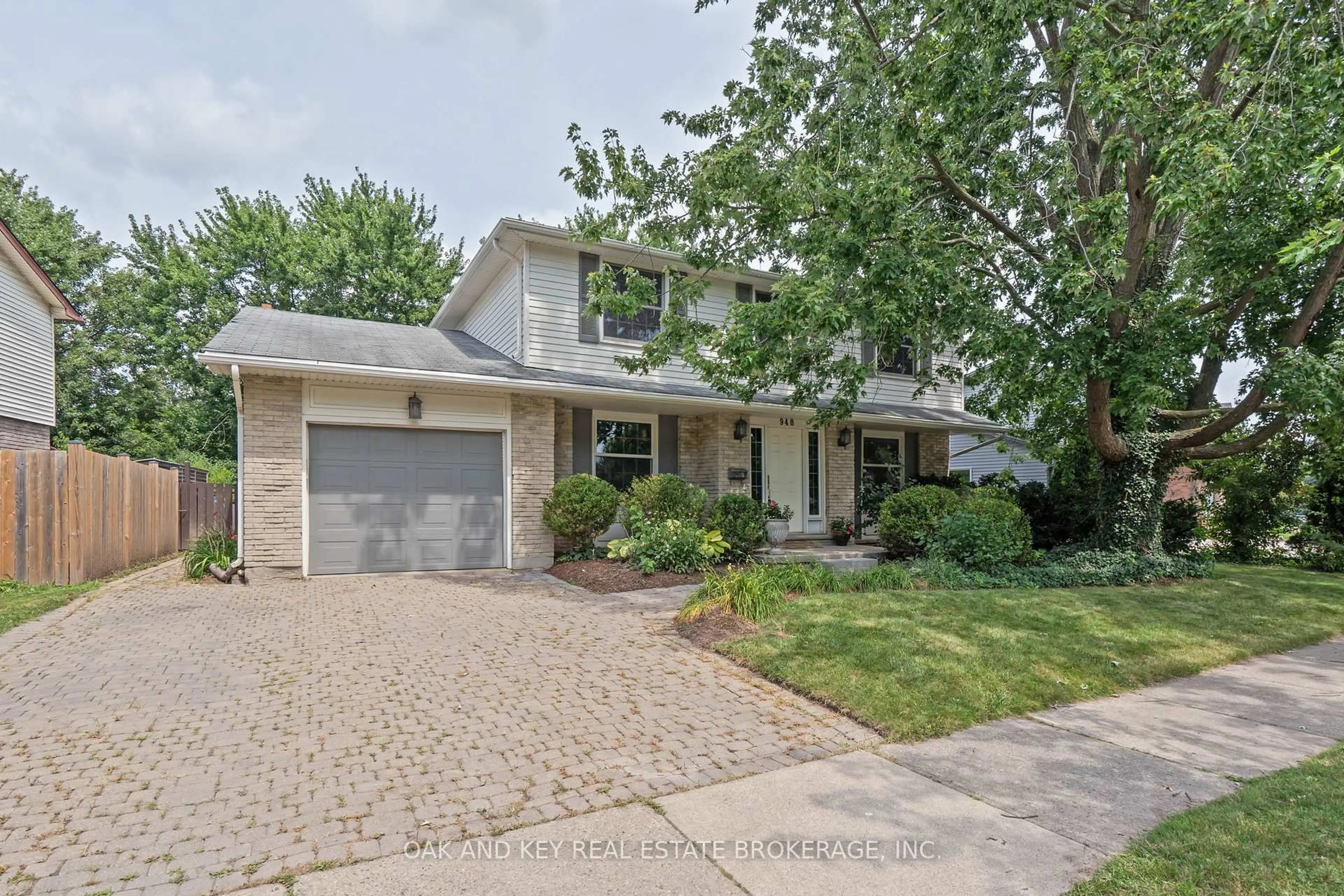 Home with brick exterior material, street for 948 FARNHAM Rd, London South Ontario N6K 1S1