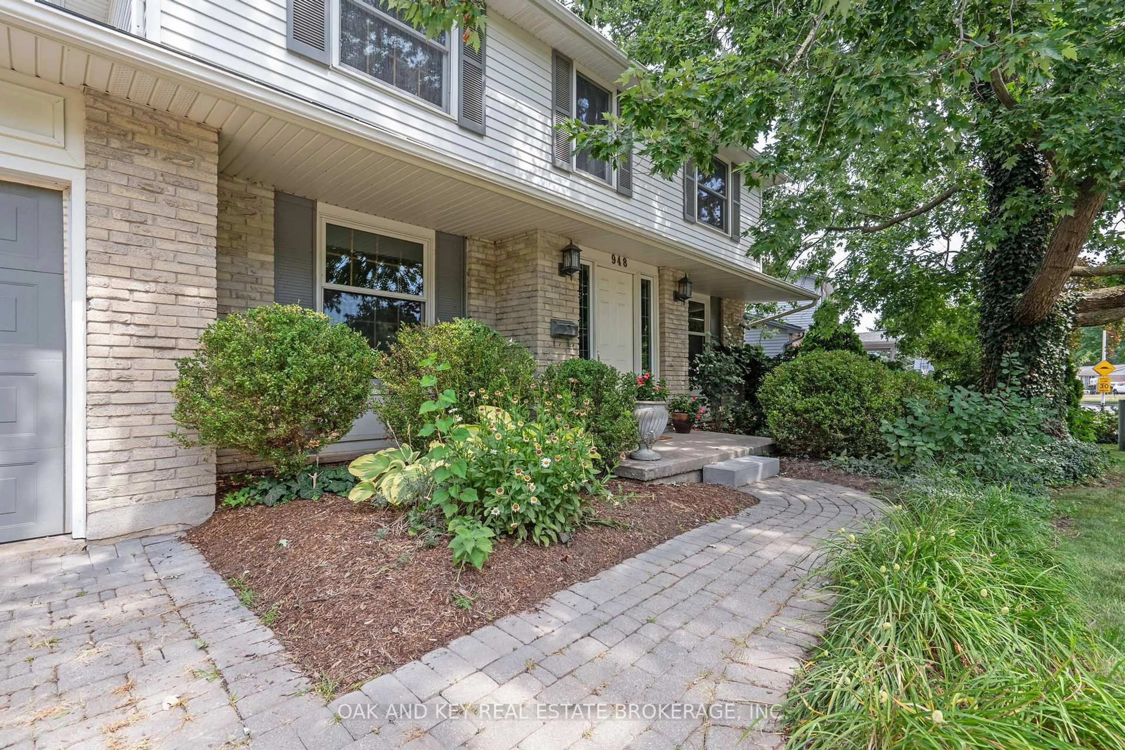 Home with brick exterior material, street for 948 FARNHAM Rd, London South Ontario N6K 1S1
