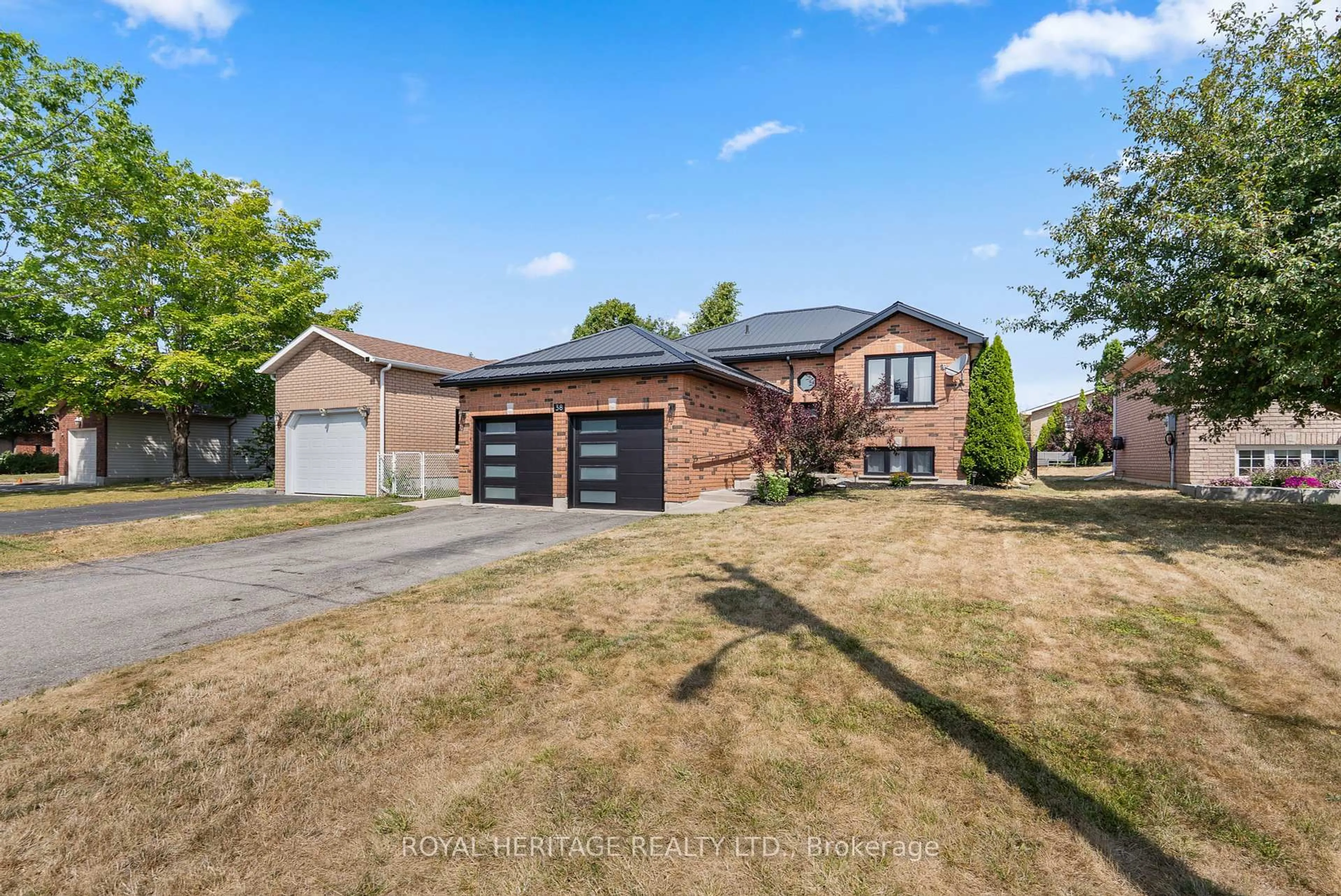 Home with brick exterior material, street for 38 Mcgibbon Blvd, Kawartha Lakes Ontario K9V 6G4