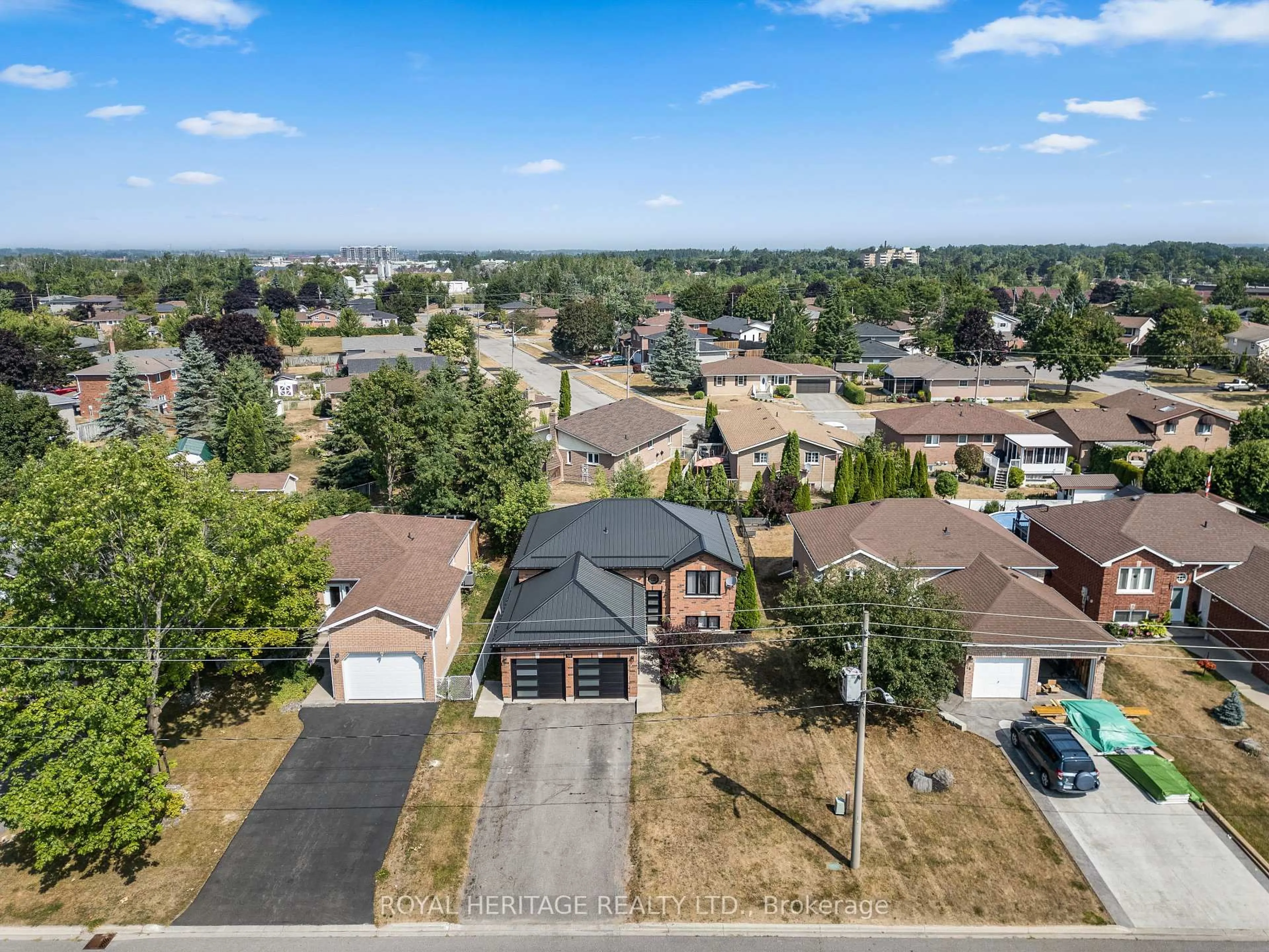 A pic from outside/outdoor area/front of a property/back of a property/a pic from drone, street for 38 Mcgibbon Blvd, Kawartha Lakes Ontario K9V 6G4