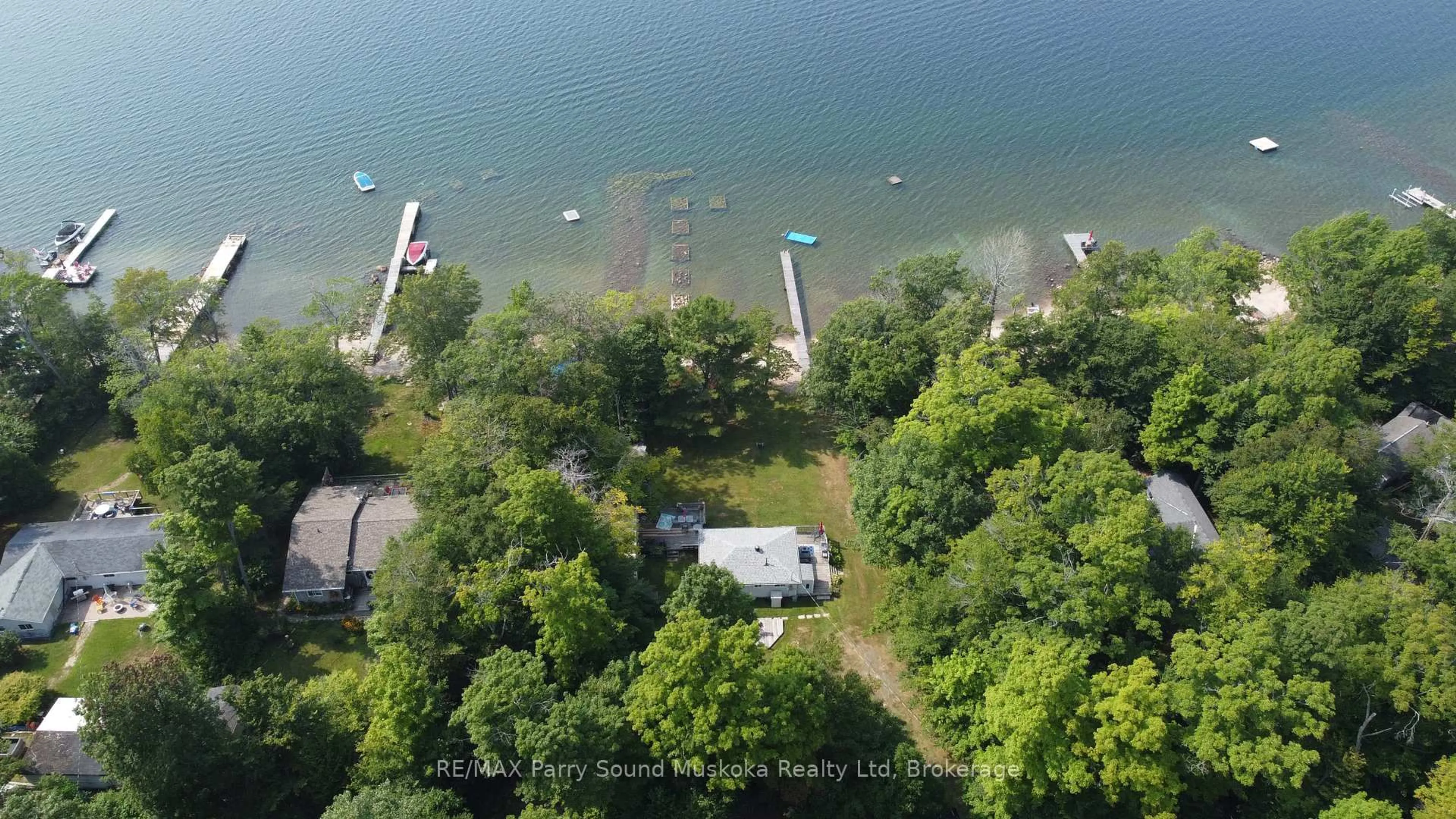 A pic from outside/outdoor area/front of a property/back of a property/a pic from drone, water/lake/river/ocean view for 426 Oak Point Rd #(Lot 14), Parry Sound Ontario P2A 2X4