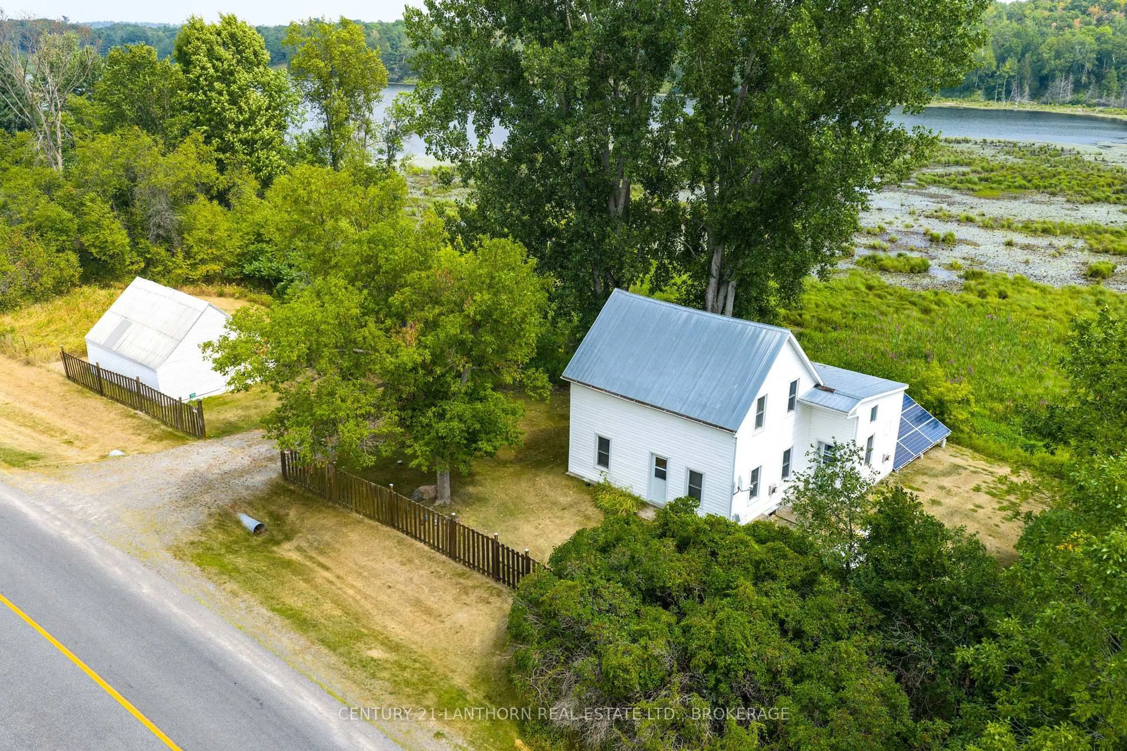 A pic from outside/outdoor area/front of a property/back of a property/a pic from drone, water/lake/river/ocean view for 2905 County Rd 15 Rd, Tamworth Ontario K0K 3G0
