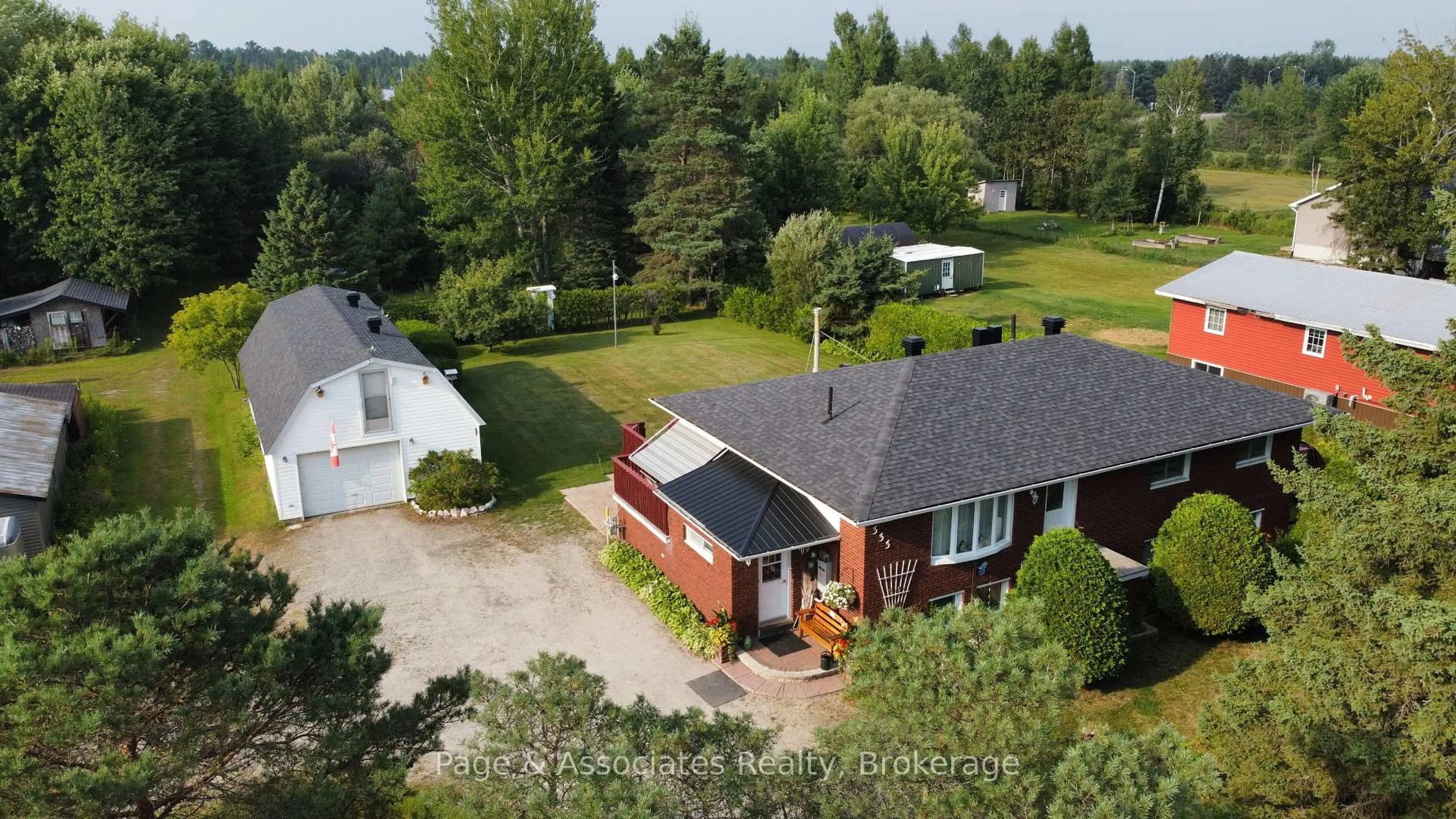 A pic from outside/outdoor area/front of a property/back of a property/a pic from drone, unknown for 333 Salter St, West Nipissing Ontario P2B 2T5