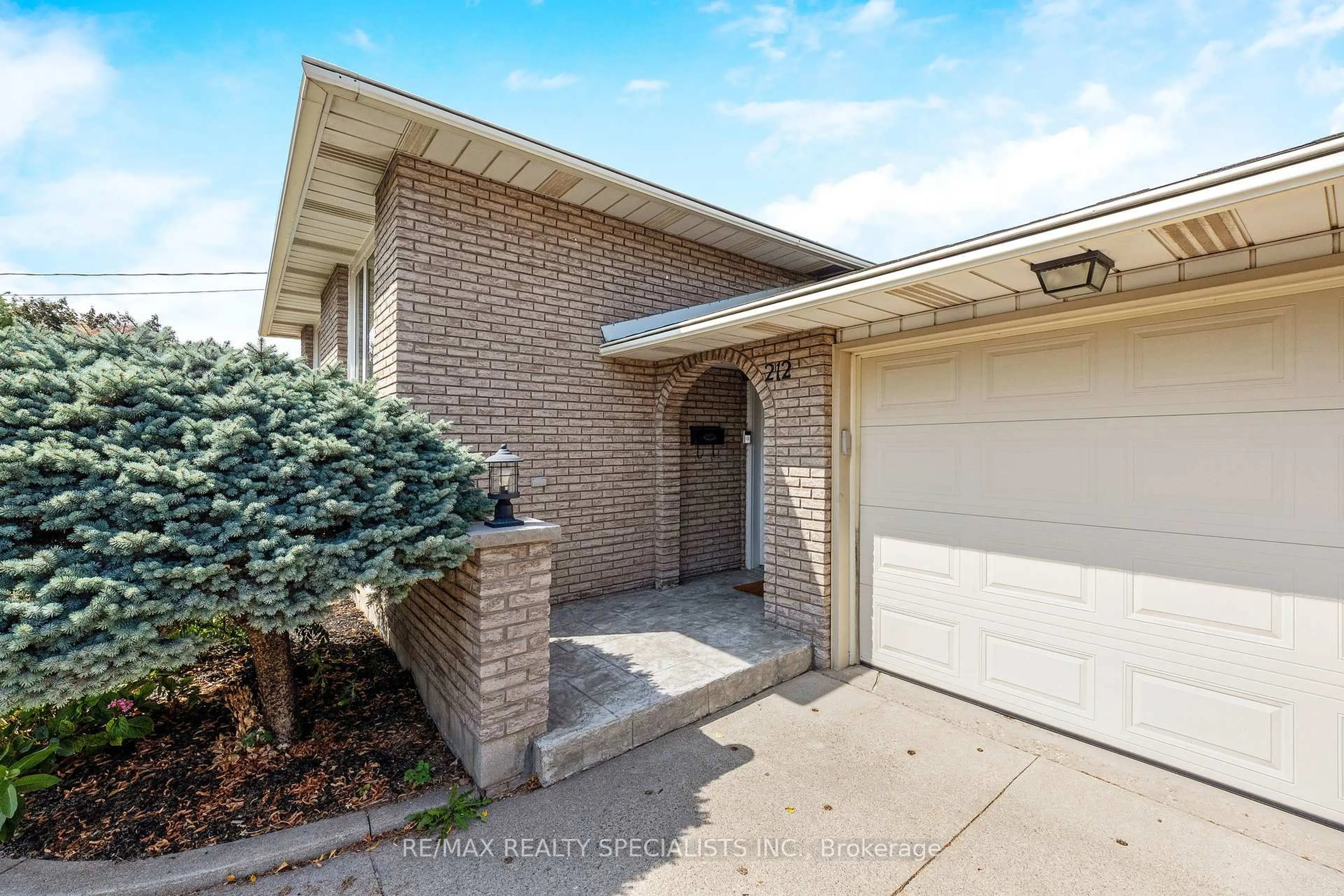 Home with brick exterior material, street for 212 Memorial Ave, Hamilton Ontario L8G 3B1