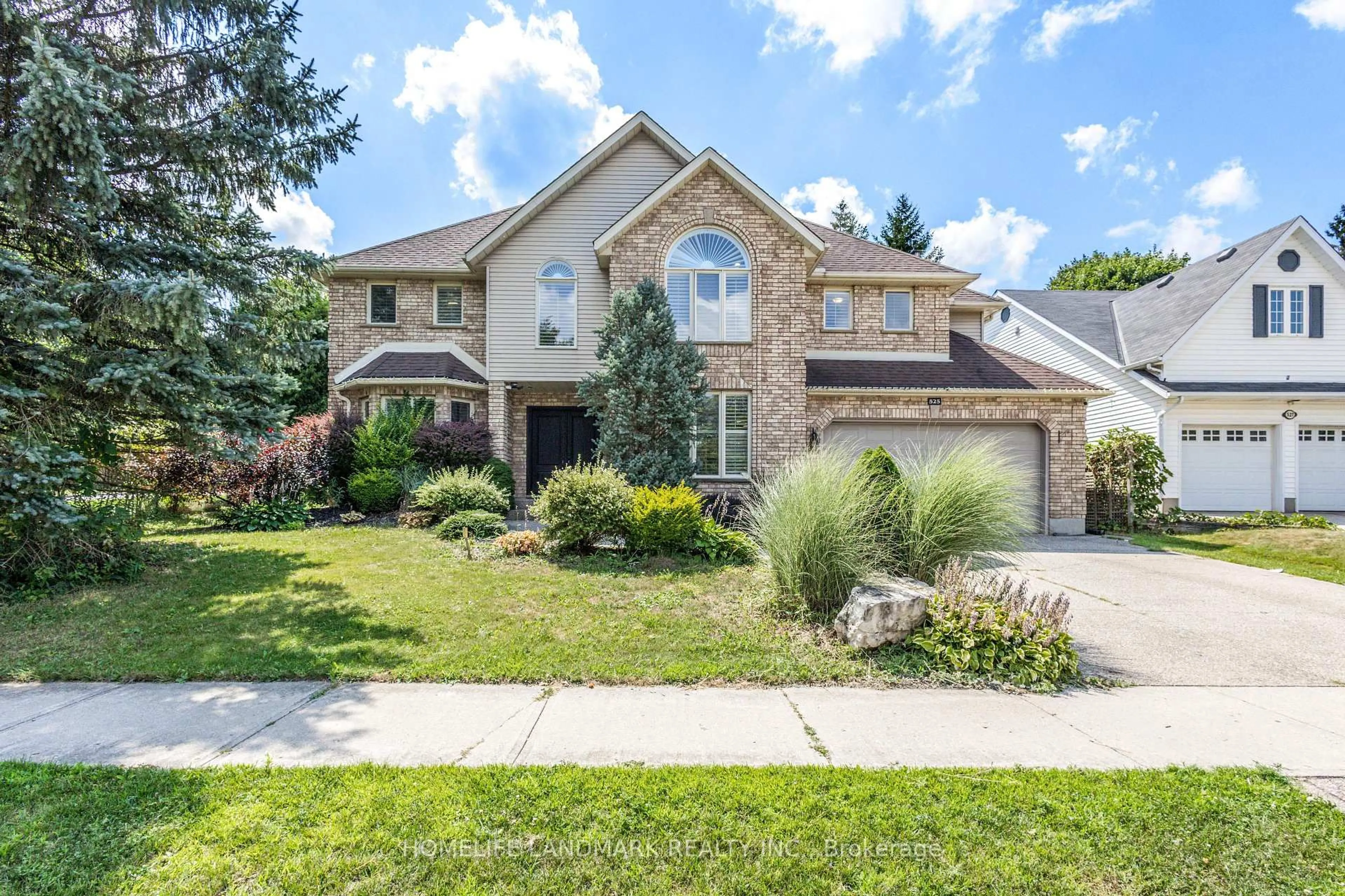 Home with brick exterior material, street for 525 Leighland Dr, Waterloo Ontario N2T 2H5