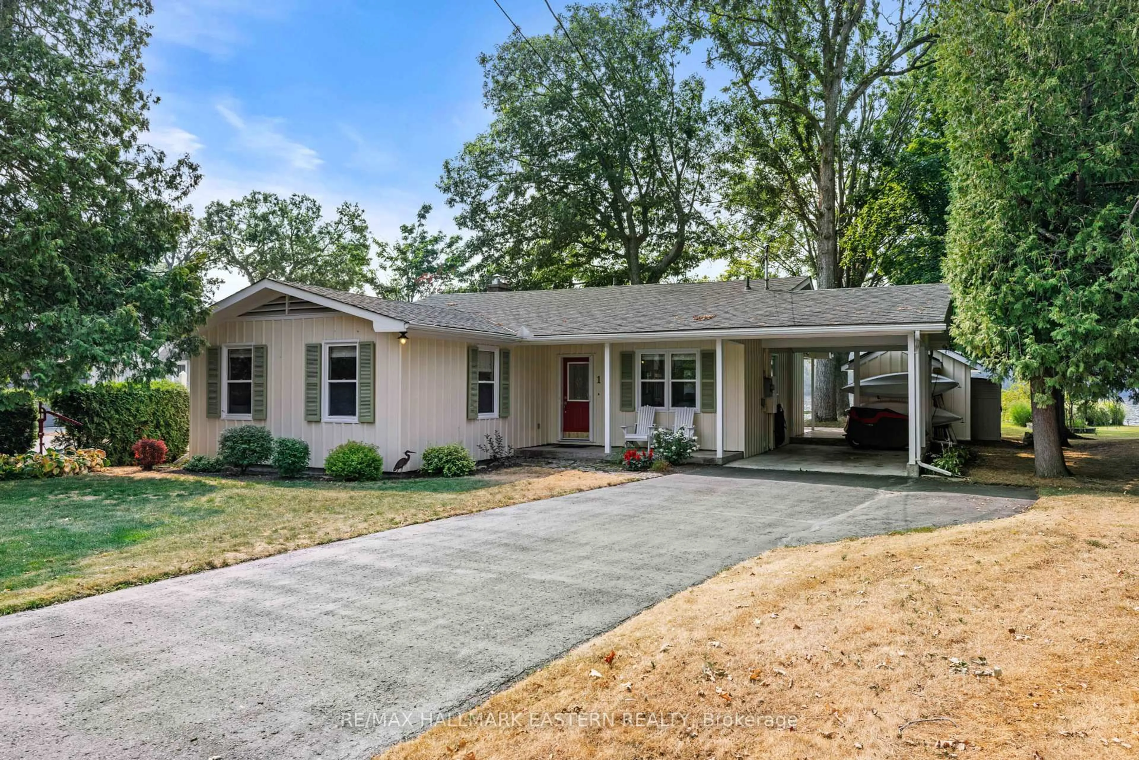 Home with vinyl exterior material, street for 15 Snake Point Rd, Kawartha Lakes Ontario K0M 1A0